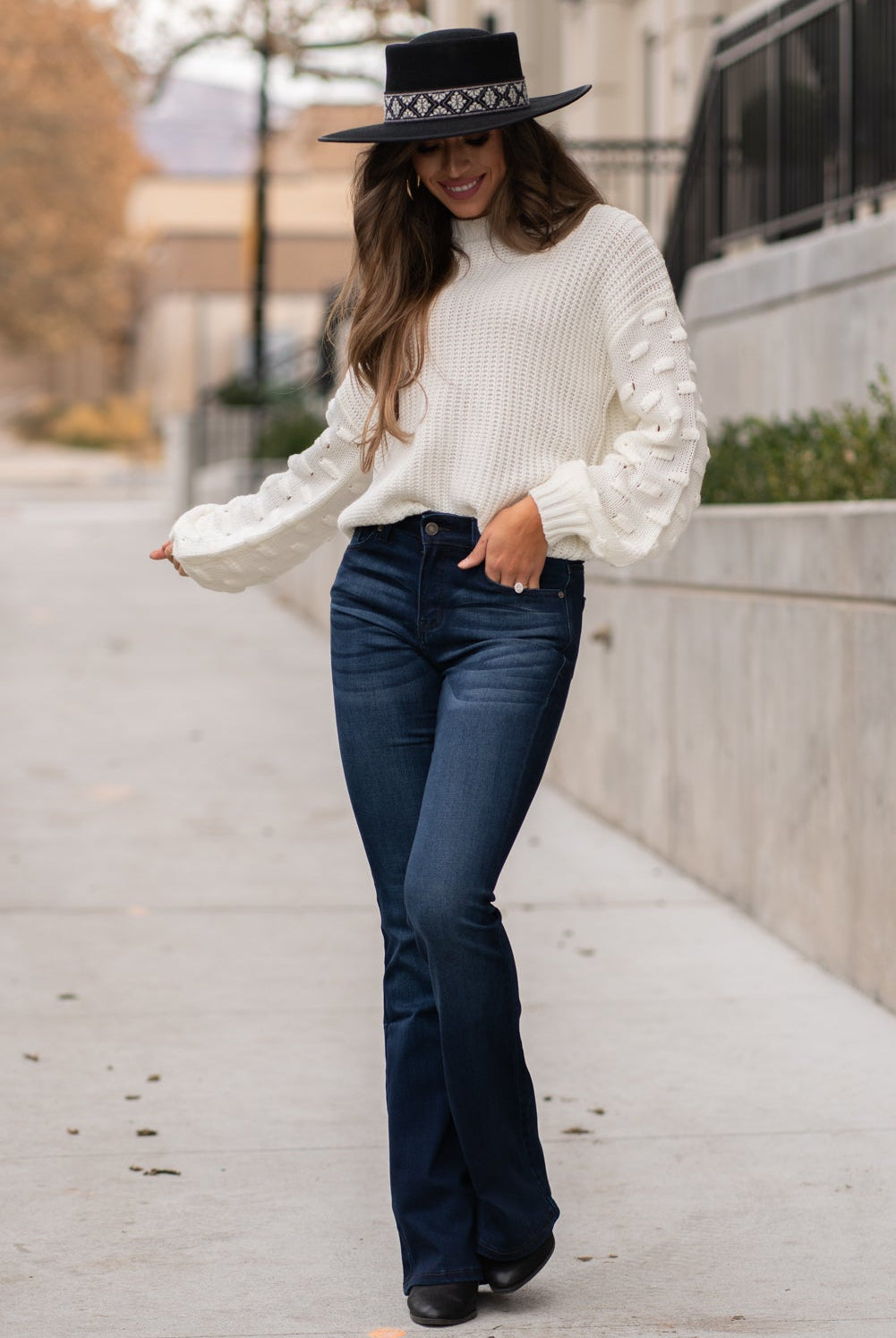 KanCan Jeans Collection: Core Style Color: Dark Wash Cut: Flare, 33.75" Inseam Rise: Mid-Rise, 9" Front Rise 54% 54% COTTON 34% Rayon 10% POLYESTER 2% SPANDEX Fly: Zipper Style #: KC6102D Contact us for any additional measurements or sizing. Taylor is 5'7" and wears a size 4 in jeans, small top and an 8.5 in shoes. She is wearing a size size 25/3 in these jeans.