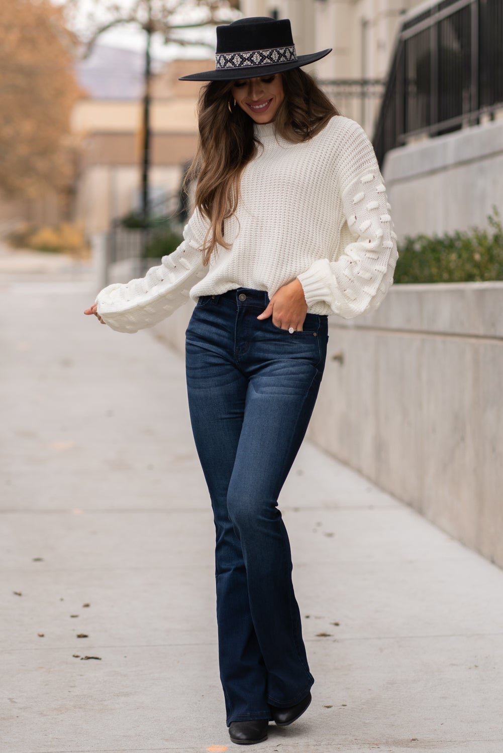 KanCan Jeans Collection: Core Style Color: Dark Wash Cut: Flare, 33.75" Inseam Rise: Mid-Rise, 9" Front Rise 54% 54% COTTON 34% Rayon 10% POLYESTER 2% SPANDEX Fly: Zipper Style #: KC6102D Contact us for any additional measurements or sizing. Taylor is 5'7" and wears a size 4 in jeans, small top and an 8.5 in shoes. She is wearing a size size 25/3 in these jeans.