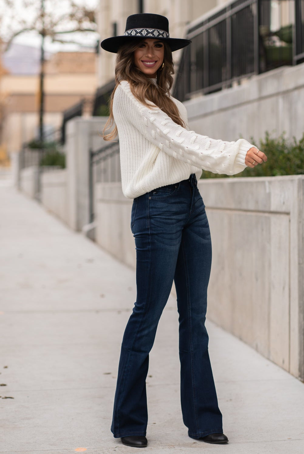 KanCan Jeans Collection: Core Style Color: Dark Wash Cut: Flare, 33.75" Inseam Rise: Mid-Rise, 9" Front Rise 54% 54% COTTON 34% Rayon 10% POLYESTER 2% SPANDEX Fly: Zipper Style #: KC6102D Contact us for any additional measurements or sizing. Taylor is 5'7" and wears a size 4 in jeans, small top and an 8.5 in shoes. She is wearing a size size 25/3 in these jeans.