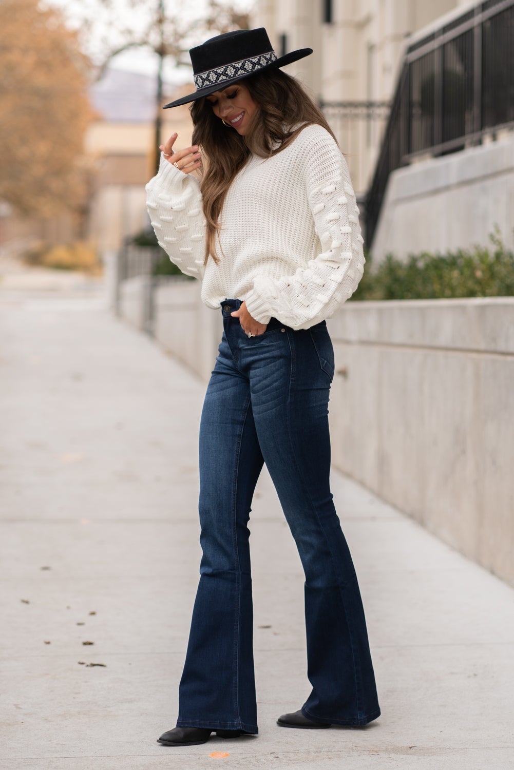 KanCan Jeans Collection: Core Style Color: Dark Wash Cut: Flare, 33.75" Inseam Rise: Mid-Rise, 9" Front Rise 54% 54% COTTON 34% Rayon 10% POLYESTER 2% SPANDEX Fly: Zipper Style #: KC6102D Contact us for any additional measurements or sizing. Taylor is 5'7" and wears a size 4 in jeans, small top and an 8.5 in shoes. She is wearing a size size 25/3 in these jeans.