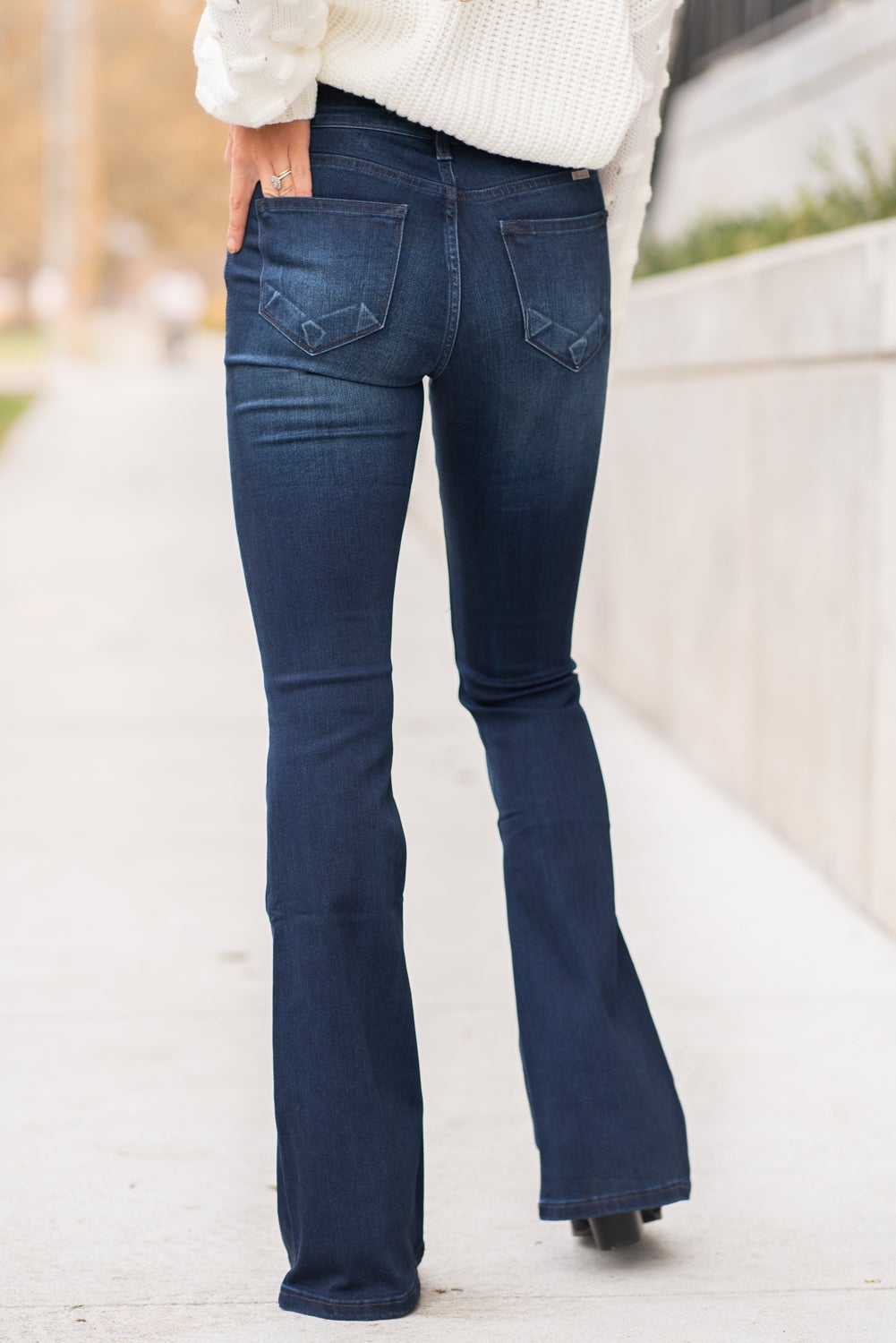 KanCan Jeans Collection: Core Style Color: Dark Wash Cut: Flare, 33.75" Inseam Rise: Mid-Rise, 9" Front Rise 54% 54% COTTON 34% Rayon 10% POLYESTER 2% SPANDEX Fly: Zipper Style #: KC6102D Contact us for any additional measurements or sizing. Taylor is 5'7" and wears a size 4 in jeans, small top and an 8.5 in shoes. She is wearing a size size 25/3 in these jeans.