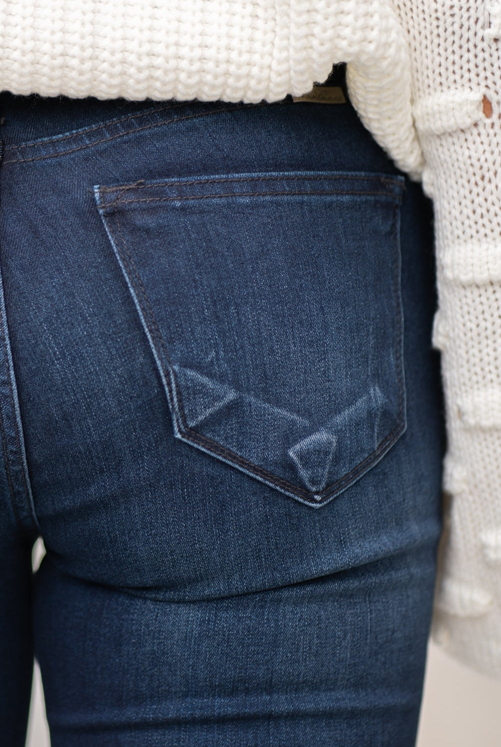 KanCan Jeans Collection: Core Style Color: Dark Wash Cut: Flare, 33.75" Inseam Rise: Mid-Rise, 9" Front Rise 54% 54% COTTON 34% Rayon 10% POLYESTER 2% SPANDEX Fly: Zipper Style #: KC6102D Contact us for any additional measurements or sizing. Taylor is 5'7" and wears a size 4 in jeans, small top and an 8.5 in shoes. She is wearing a size size 25/3 in these jeans.