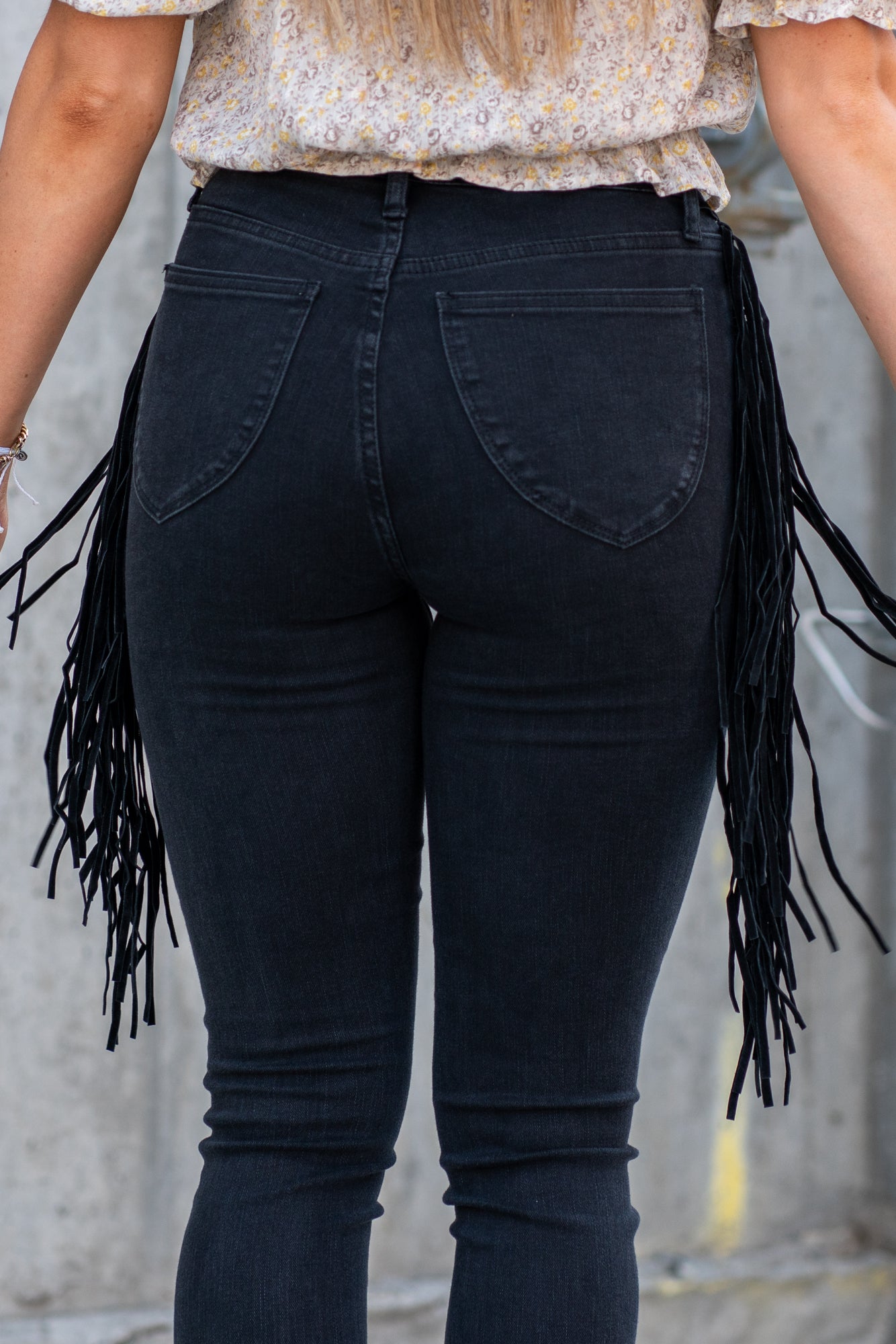 Judy Blue These pull-on jeggings have a fringe side detail and stretchy band waist. Carefully designed by Judy Blue to pull on and go. With a dark wash in black, these will be your new night-out jeans. Color: Black Cut: Pull-On Skinny, 28" Inseam* Rise: High-Rise, 10.75" Front Rise* Material: 52% Cotton, 22% Rayon, 23% Polyester, 3% Lycra Stitching: Classic Fly: Pull-On Style #: JB88497 | 88497 Contact us for any additional measurements or sizing.