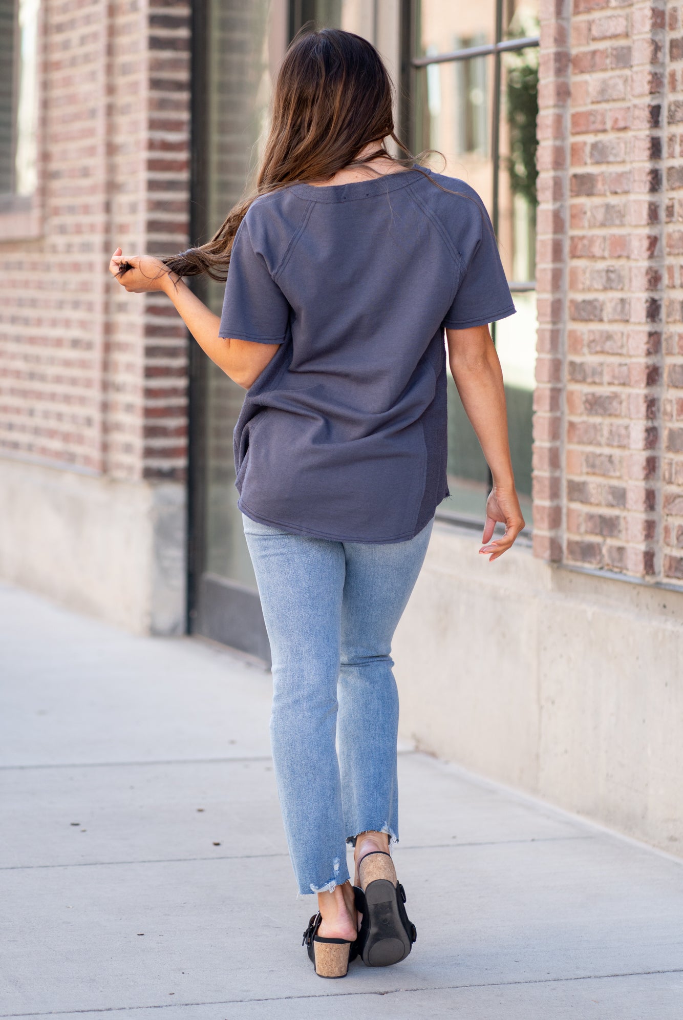 This short sleeve Henley top is great for layering up or down during winter and pairs well with any denim.  Color: Slate Grey Button Up Front Henley Raglan Top Neckline: Round Sleeve: Short Sleeve 80% COTTON 20% POLYESTER Style #: FBT7658-A19-Slategrey Contact us for any additional measurements or sizing.