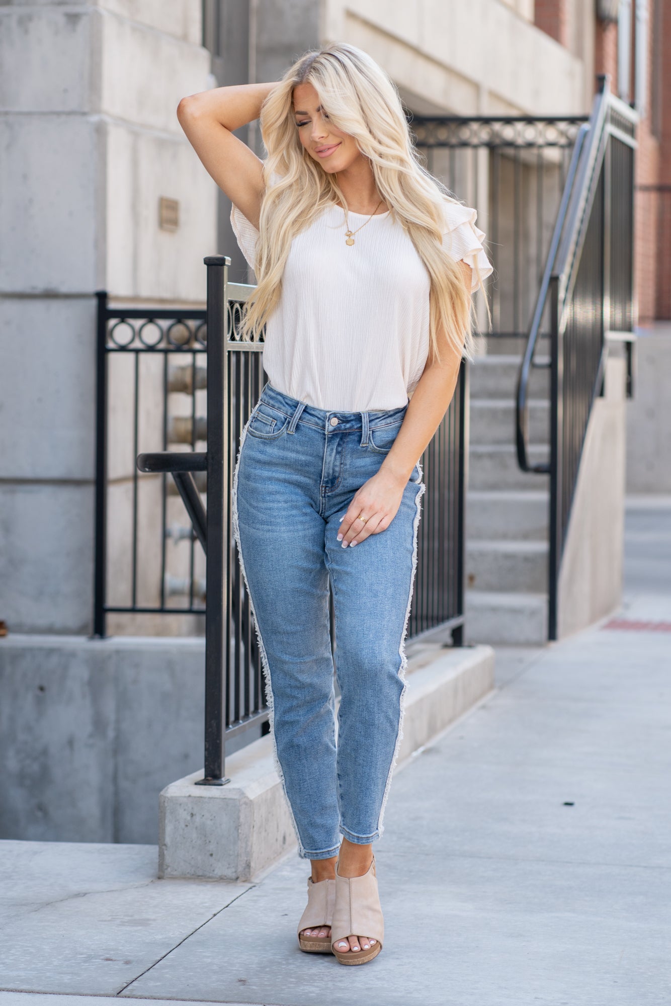 Judy Blue Tired of your skinny jeans? These cute slim fits will be your favorites. With a fringe fray seam detail, it's just enough detail to embellish your outfit. Color: Medium Blue Cut: Straight fit, 28.5" Inseam* High Rise, 10.5" Front Rise* Material: 94% Cotton / 5% Polyester / 1% Spandex Stitching: Classic Fly: Zipper Fly Style #: JB88461-PL | 88461-PL *Measured on the smallest size, measurements may vary by size. Contact us for any additional measurements or sizing.