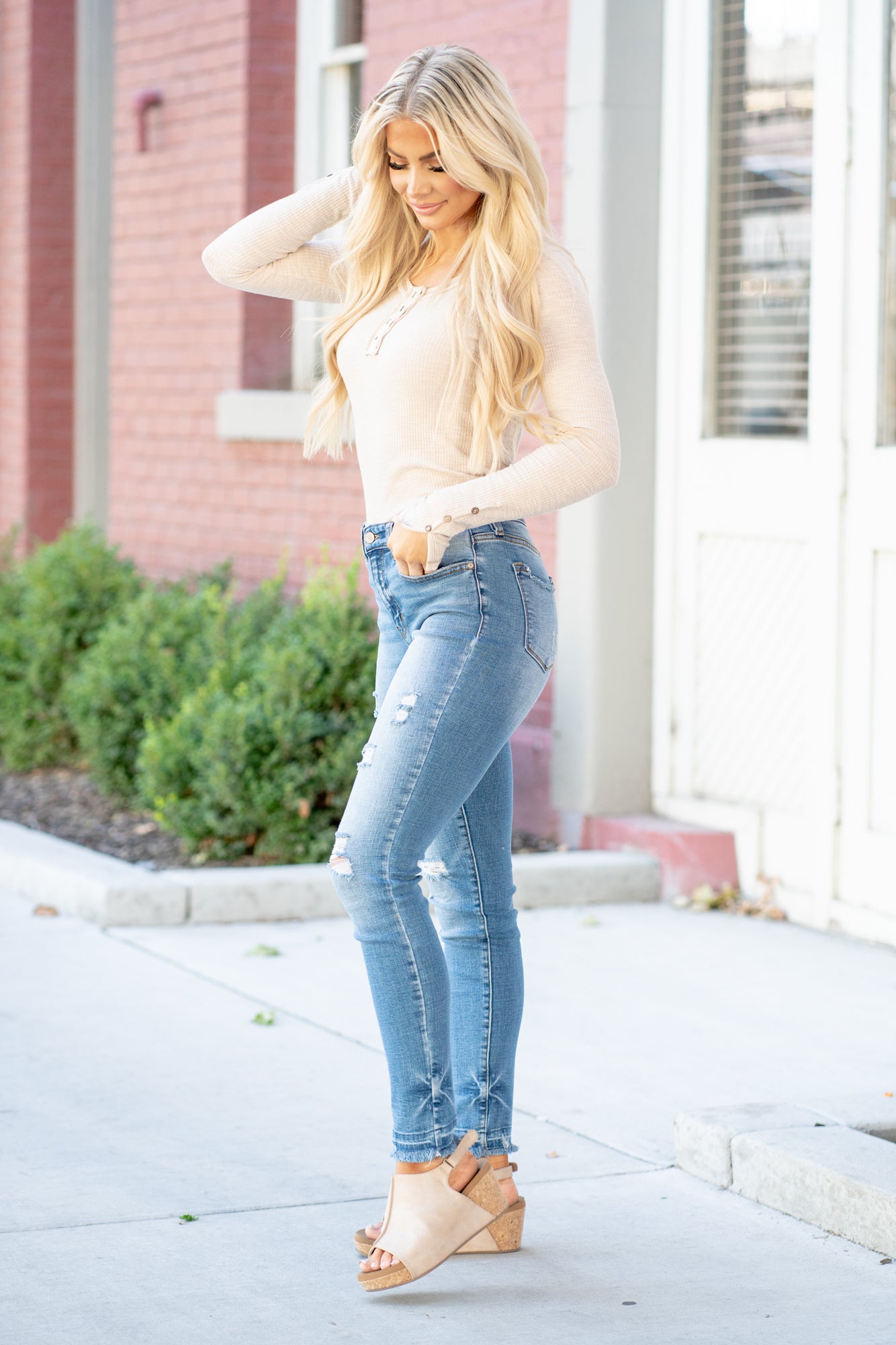 KanCan Jeans These high-rise dark wash skinny jeans have a slightly distressed hem with a fitted skinny leg. Color: Medium Blue Cut: Skinny, 29.5" Inseam* Rise: High-Rise, 9.75" Front Rise* 98% COTTON 2% SPANDEX Stitching: Classic Fly: Zipper Style #: KC8347M Contact us for any additional measurements or sizing. *Measured on the smallest size, measurements may vary by size. Cas is 5'7" and wears a size 25 in jeans, a small in tops, and 8 in shoes. She is wearing size 25 in these jeans.