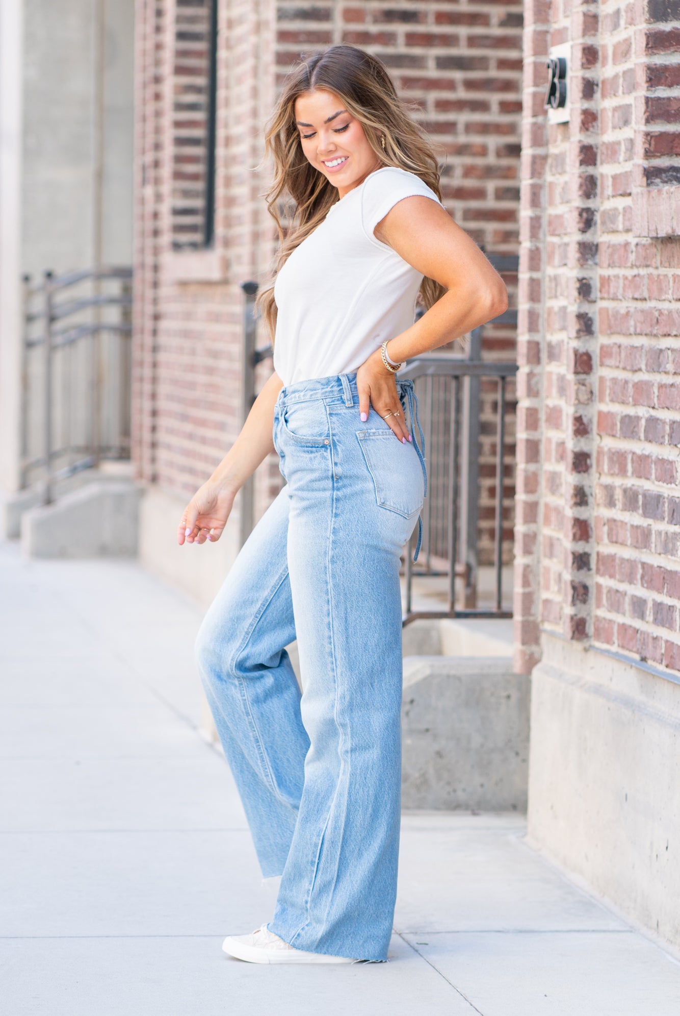 KanCan Jeans KanCan Rigid Denim Flare, 32" Inseam High Rise, 12" Front Rise Light Blue Wash 100% Cotton Fly: Exposed Button Style #: KC8725L Contact us for any additional measurements or sizing. *Measured on the smallest size, measurements may vary by size. Jacquelyn wears a size 25 in jeans, a small in tops, and 6.5 in shoes. She is wearing a size 25 in these jeans.