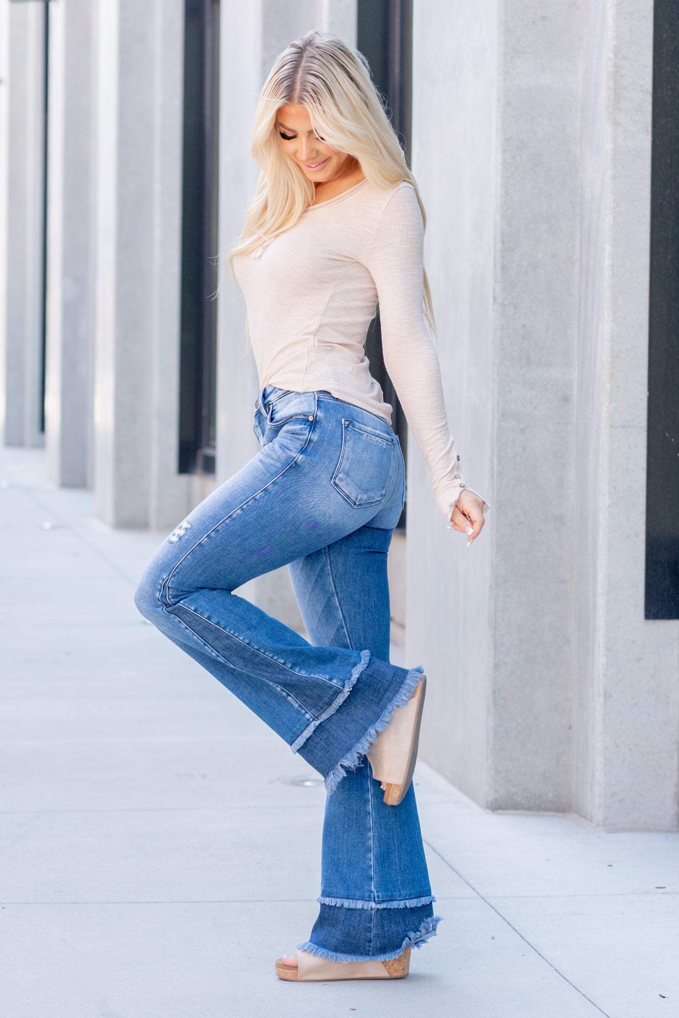 KanCan Jeans KanCan Stretch Leve: Comfort Stretch Flare, 34" Inseam* High Rise, 10" Front Rise* Medium Blue Wash SELF: 93% COTTON, 5% POLYESTER, 2% SPANDEX CONTRAST: 93% COTTON 6% POLYESTER, 1% SPANDEX Fly: Zipper Style #: KC9334M *Measured on the smallest size, measurements may vary by size.