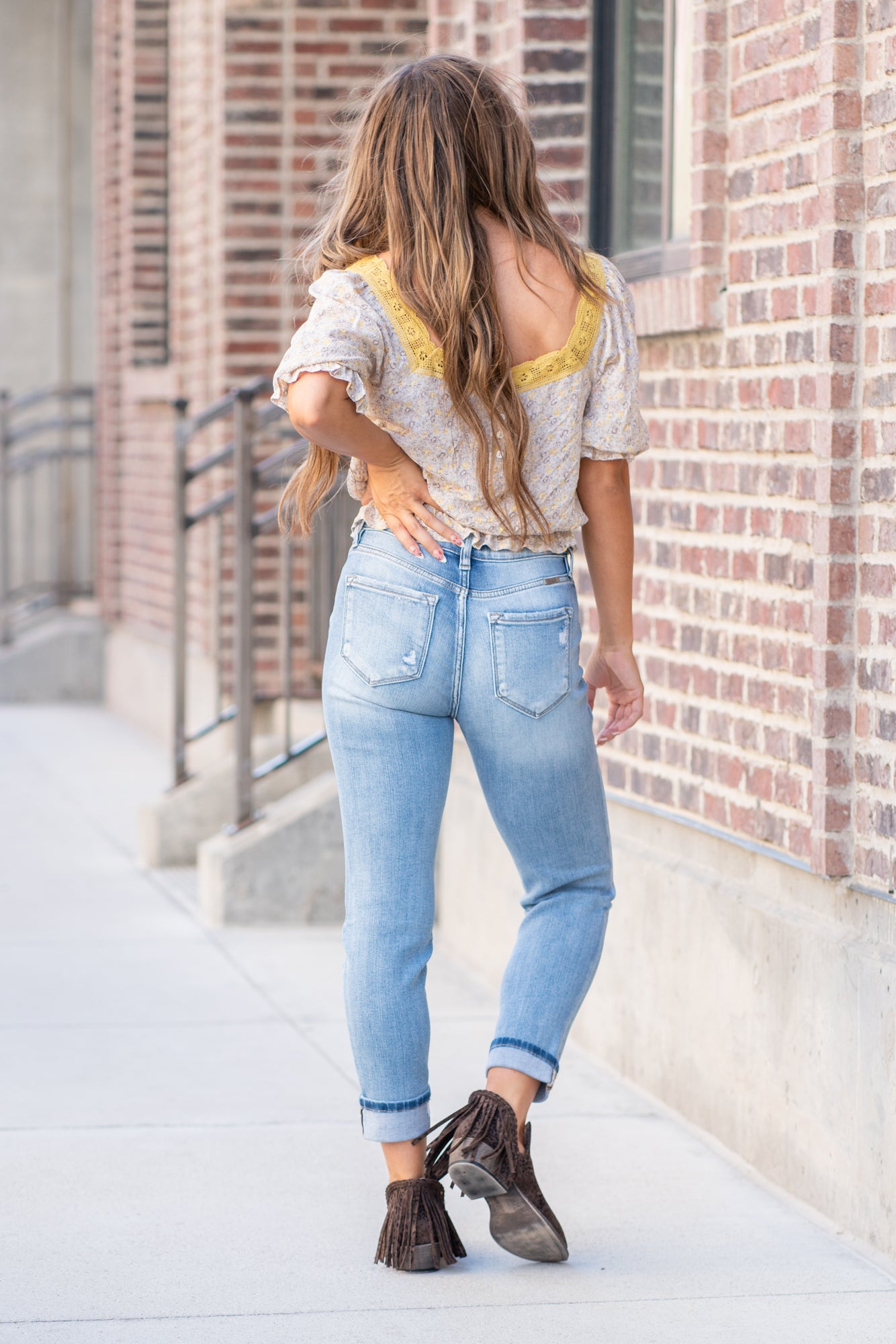 KanCan Jeans These mom jeans will become your go-to! Pair these girlfriend mom fit with booties and a tee for an easy fall look. Color: Medium Blue Wash Cut: Straight Fit, 26" Inseam Cuffed* Rise: High-Rise, 11" Front Rise* 94% COTTON , 5% POLYESTER , 1% SPANDEX Fly: Zipper Style #: KC9232M Contact us for any additional measurements or sizing.