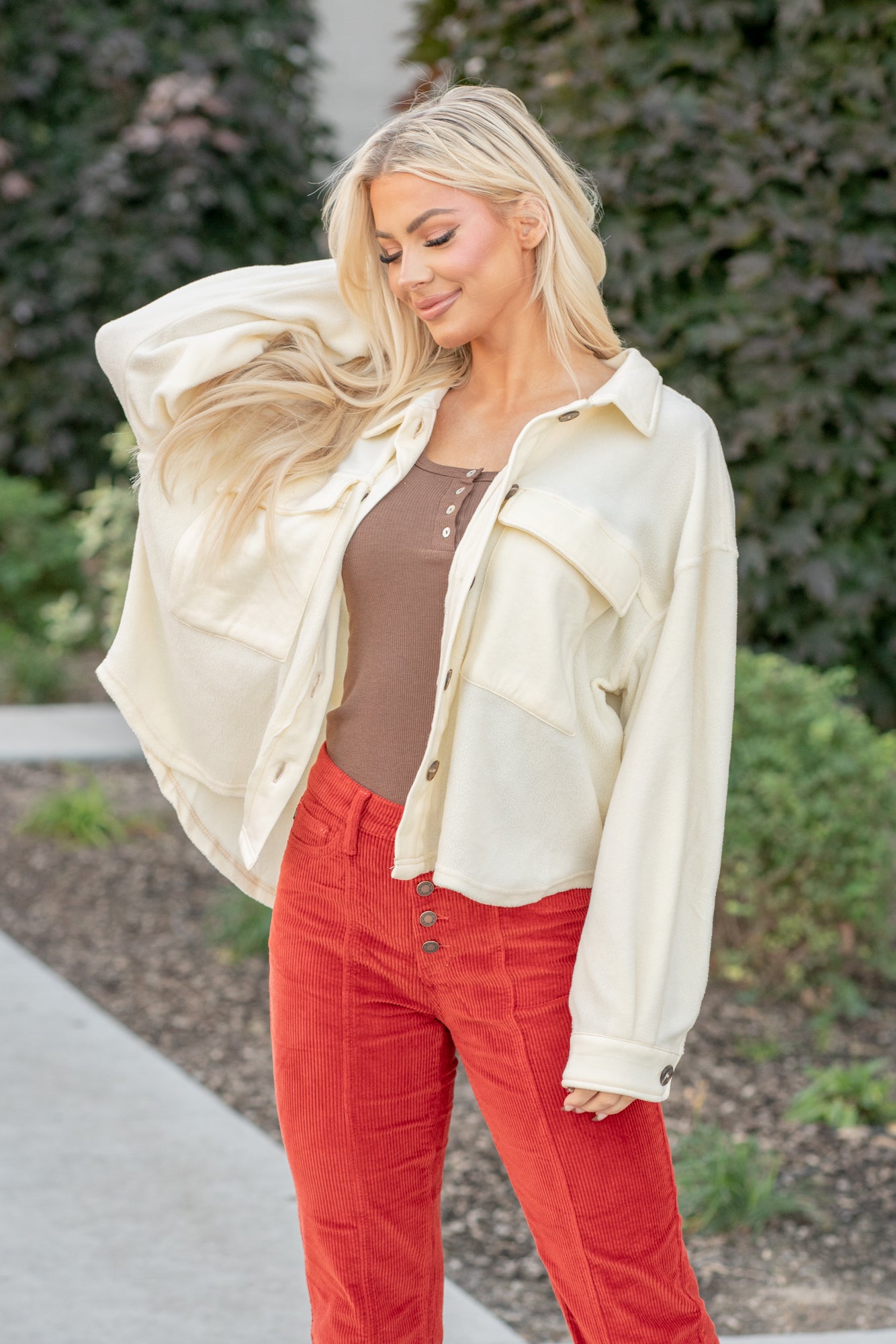 What is fall with shackets? Pair this fleece jacket with a tank and your favorite dad jeans this fall for an updated look this fall. Color: Cream Neckline: Open, Button Up Sleeve: Long Sleeves 100% POLYESTER Style #: HAJ1726 *Measured on the smallest size, measurements may vary by size. Contact us for any additional measurements or sizing. Cas is 5'7" and wears a size 25 in jeans, a small in tops, and 8 in shoes. She is wearing a size small in this jacket.
