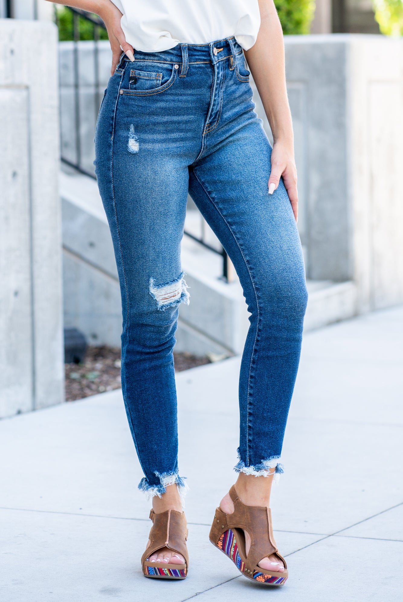 KanCan Jeans Color: Dark Blue Cut: Skinny, 27.5" Inseam* Rise: High-Rise, 10.5" Front Rise* COTTON 95% POLYESTER 4% SPANDEX 1% Stitching: Classic Fly: Zipper Style #: KC8567D Contact us for any additional measurements or sizing. *Measured on the smallest size, measurements may vary by size.