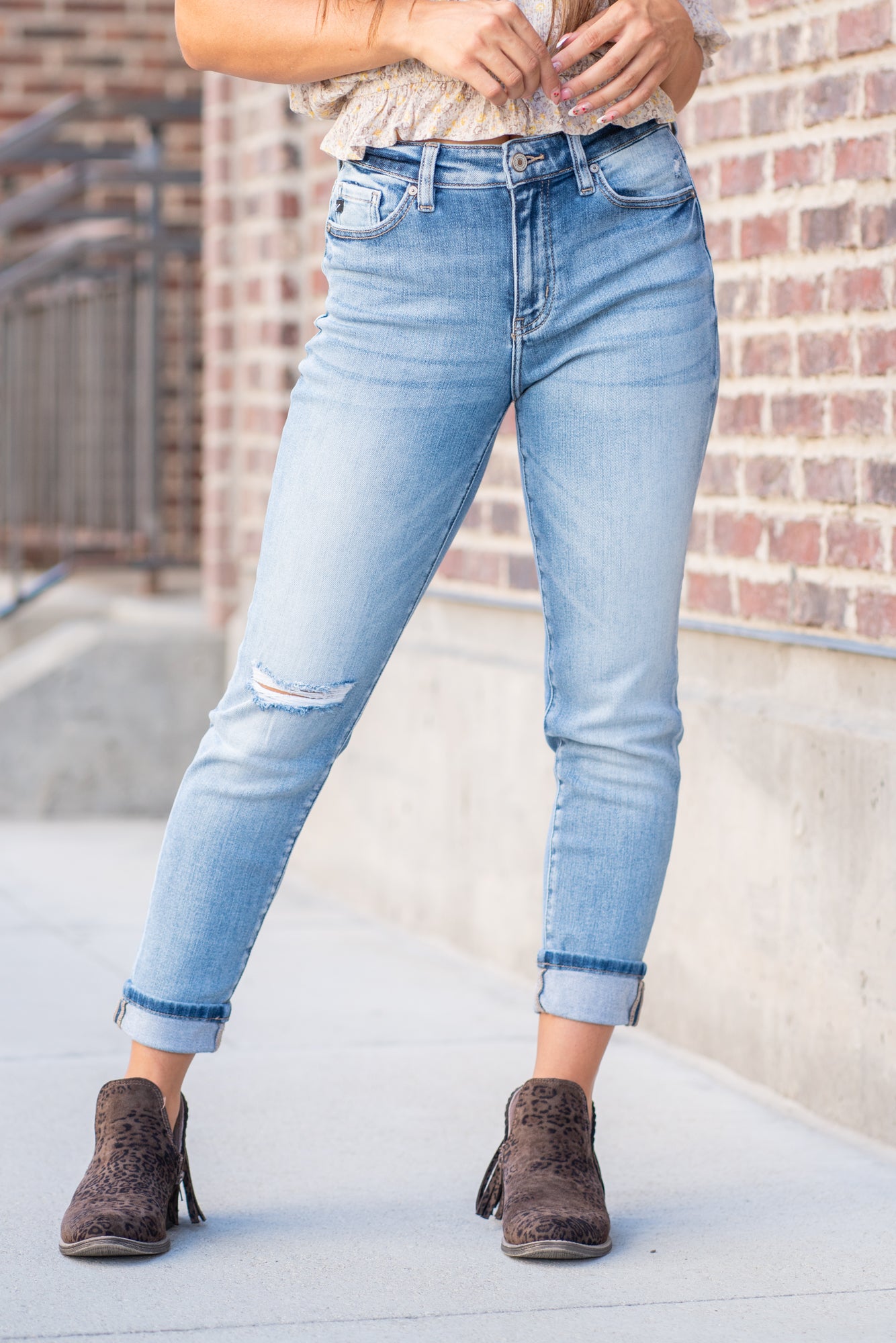 KanCan Jeans These mom jeans will become your go-to! Pair these girlfriend mom fit with booties and a tee for an easy fall look. Color: Medium Blue Wash Cut: Straight Fit, 26" Inseam Cuffed* Rise: High-Rise, 11" Front Rise* 94% COTTON , 5% POLYESTER , 1% SPANDEX Fly: Zipper Style #: KC9232M Contact us for any additional measurements or sizing.