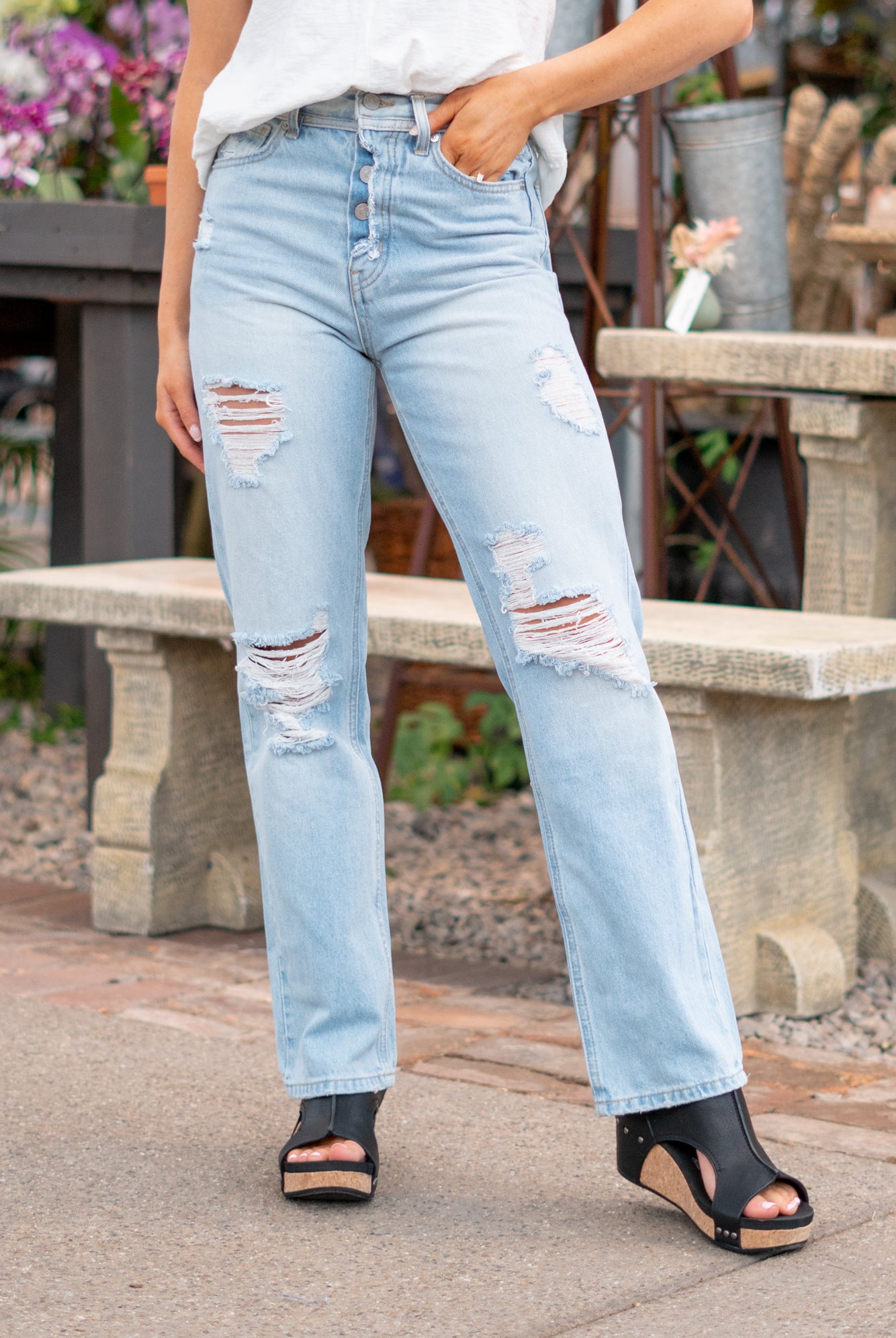 KanCan Jeans With a high waist and straight fit, these will be your go-to jeans that will never go out of style. Color: Medium Blue Cut: Straight Fit, 31" Inseam* Rise: High-Rise, 12.5" Front Rise* 100% Cotton, Rigid Denim Fly: Exposed Button Fly Style #: KC7912L Contact us for any additional measurements or sizing. *Measured on the smallest size, measurements may vary by size. Jacquelyn wears a size 25 in jeans, a small in tops, and 6.5 in shoes. She is wearing size 25 in these jeans.