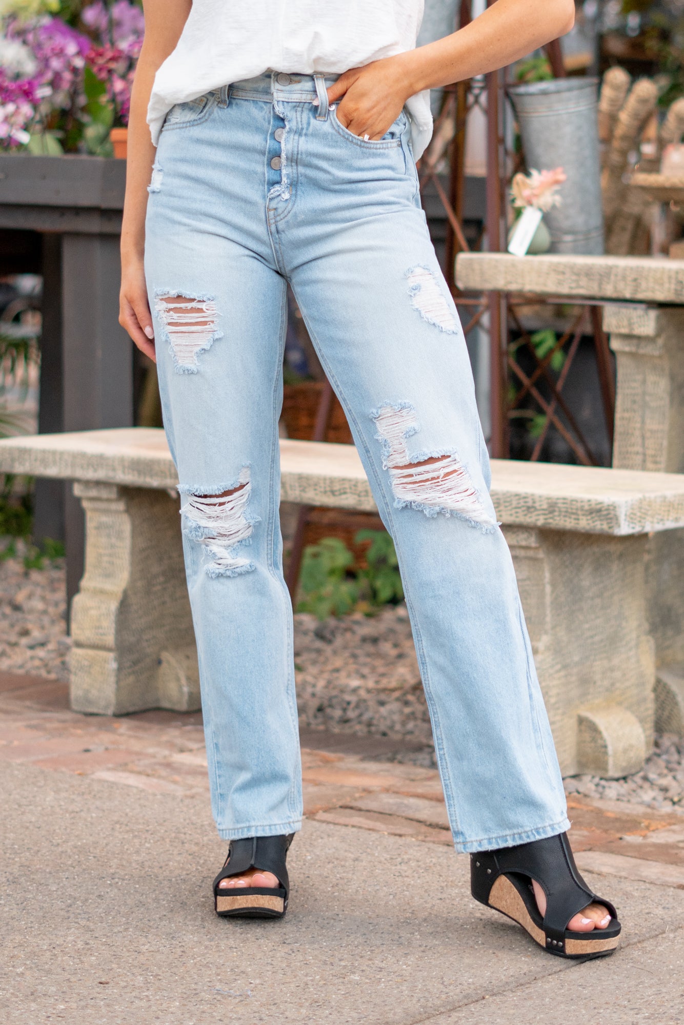 KanCan Jeans With a high waist and straight fit, these will be your go-to jeans that will never go out of style. Color: Medium Blue Cut: Straight Fit, 31" Inseam* Rise: High-Rise, 12.5" Front Rise* 100% Cotton, Rigid Denim Fly: Exposed Button Fly Style #: KC7912L Contact us for any additional measurements or sizing. *Measured on the smallest size, measurements may vary by size. Jacquelyn wears a size 25 in jeans, a small in tops, and 6.5 in shoes. She is wearing size 25 in these jeans.