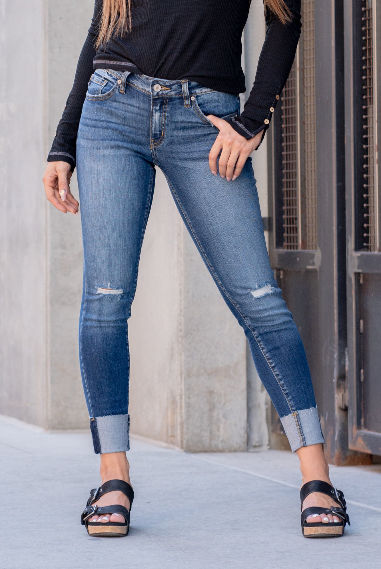 KanCan Jeans Color: Dark Blue Cut: Skinny, 27" Inseam Rise: Low-Rise, 8" Front Rise 73% COTTON, 14 % RAYON, 11% POLYESTER, 2% SPANDEX Stitching: Classic Fly: Zipper Style #: KC8245D Contact us for any additional measurements or sizing. *Measured on the smallest size, measurements may vary by size. Alyssa wears a size 25 in jeans, a small in tops, and 8 in shoes. She is wearing size 3 in these jeans.