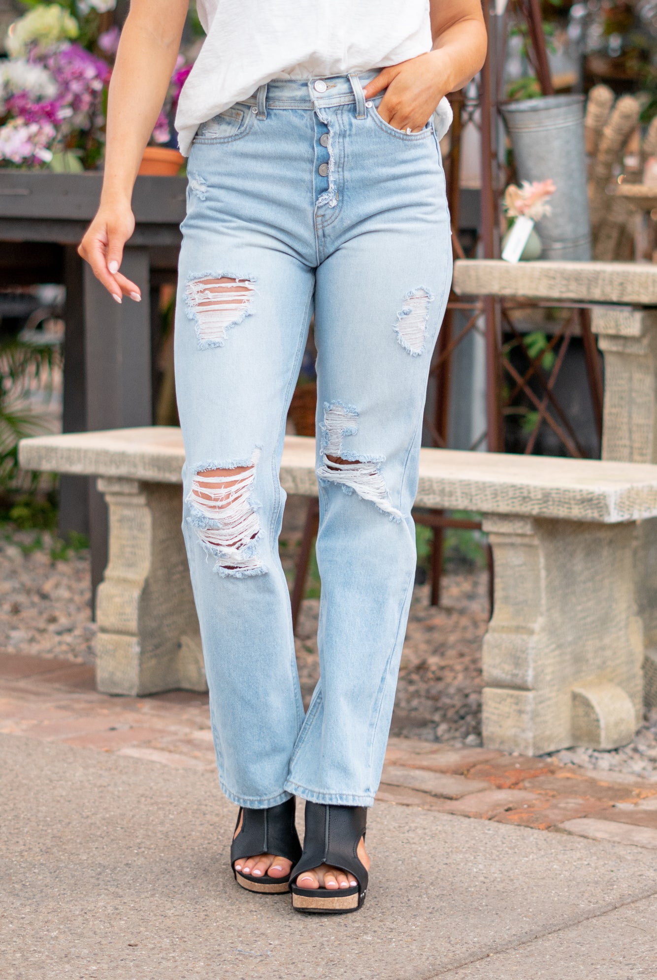KanCan Jeans With a high waist and straight fit, these will be your go-to jeans that will never go out of style. Color: Medium Blue Cut: Straight Fit, 31" Inseam* Rise: High-Rise, 12.5" Front Rise* 100% Cotton, Rigid Denim Fly: Exposed Button Fly Style #: KC7912L Contact us for any additional measurements or sizing. *Measured on the smallest size, measurements may vary by size. Jacquelyn wears a size 25 in jeans, a small in tops, and 6.5 in shoes. She is wearing size 25 in these jeans.