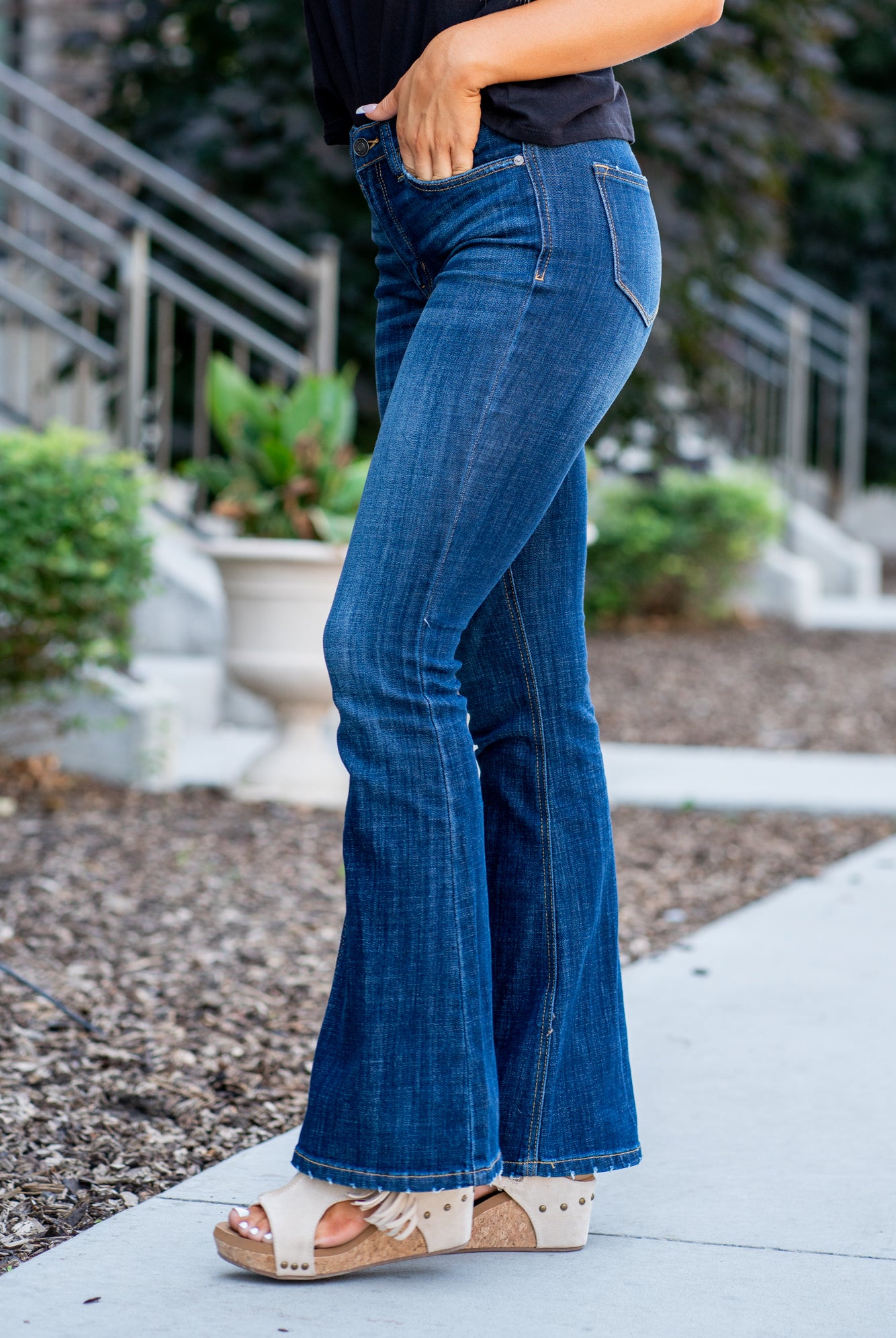 KanCan Jeans Collection: Core Style Color: Dark Wash Cut: Flare, 33.75" Inseam* Rise: Mid-Rise, 9" Front Rise* 54% 54% COTTON 34% Rayon 10% POLYESTER 2% SPANDEX Fly: Zipper Style #: KC6102LOH Contact us for any additional measurements or sizing. *Measured on the smallest size, measurements may vary by size. Cas is 5'7" and wears a size 25 in jeans, a small in tops, and 8 in shoes. She is wearing size 25 in these jeans.