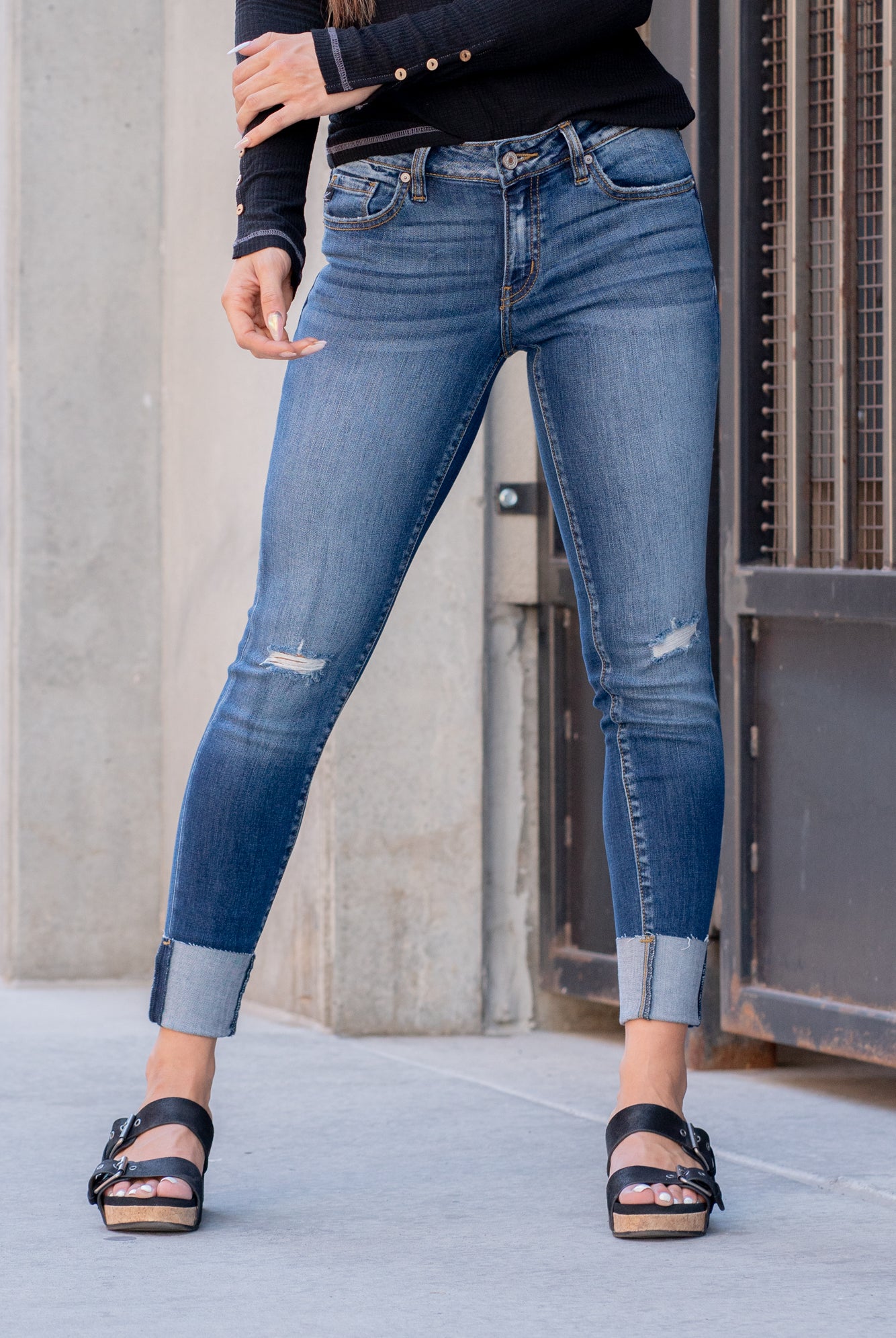 KanCan Jeans Color: Dark Blue Cut: Skinny, 27" Inseam Rise: Low-Rise, 8" Front Rise 73% COTTON, 14 % RAYON, 11% POLYESTER, 2% SPANDEX Stitching: Classic Fly: Zipper Style #: KC8245D Contact us for any additional measurements or sizing. *Measured on the smallest size, measurements may vary by size. Alyssa wears a size 25 in jeans, a small in tops, and 8 in shoes. She is wearing size 3 in these jeans.