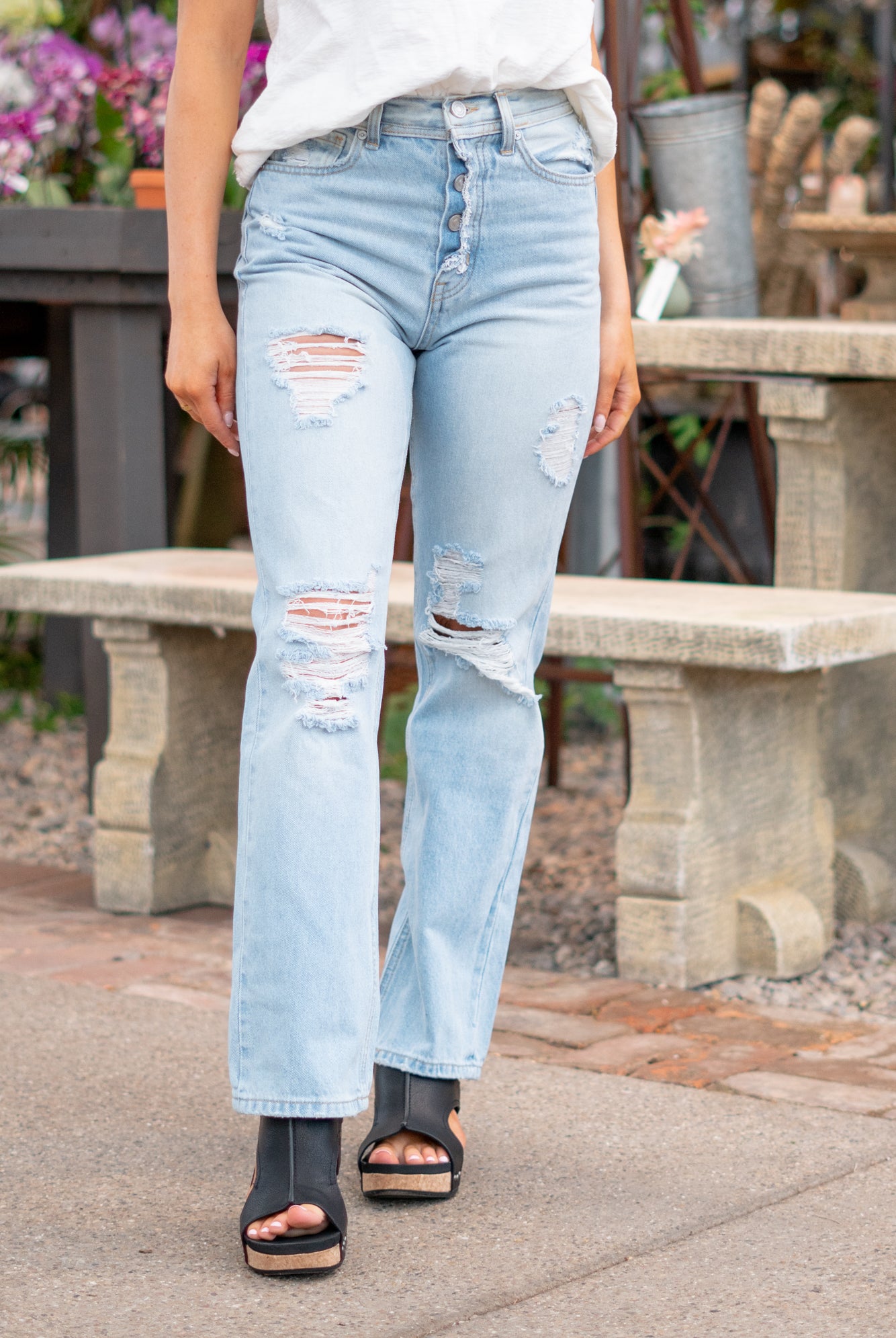 KanCan Jeans With a high waist and straight fit, these will be your go-to jeans that will never go out of style. Color: Medium Blue Cut: Straight Fit, 31" Inseam* Rise: High-Rise, 12.5" Front Rise* 100% Cotton, Rigid Denim Fly: Exposed Button Fly Style #: KC7912L Contact us for any additional measurements or sizing. *Measured on the smallest size, measurements may vary by size. Jacquelyn wears a size 25 in jeans, a small in tops, and 6.5 in shoes. She is wearing size 25 in these jeans.