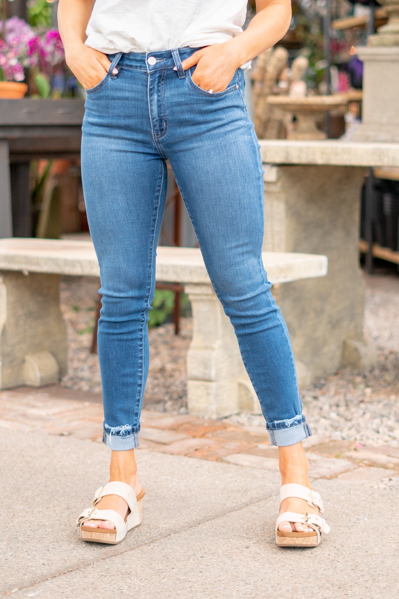 KanCan Jeans These are the ones, the classic KanCan that can be dressed up or worn casually. Pair with heels and a front tuck for a night out. Color: Medium Wash Cut: Fit Skinny, 27" Inseam Rise: High Rise, 10" Front Rise 74% COTTON, 10% RAYON, 15% POLYESTER, 1% SPANDEX Stitching: Classic Fly: Zipper Fly Style #: KC20010M Contact us for any additional measurements or sizing.