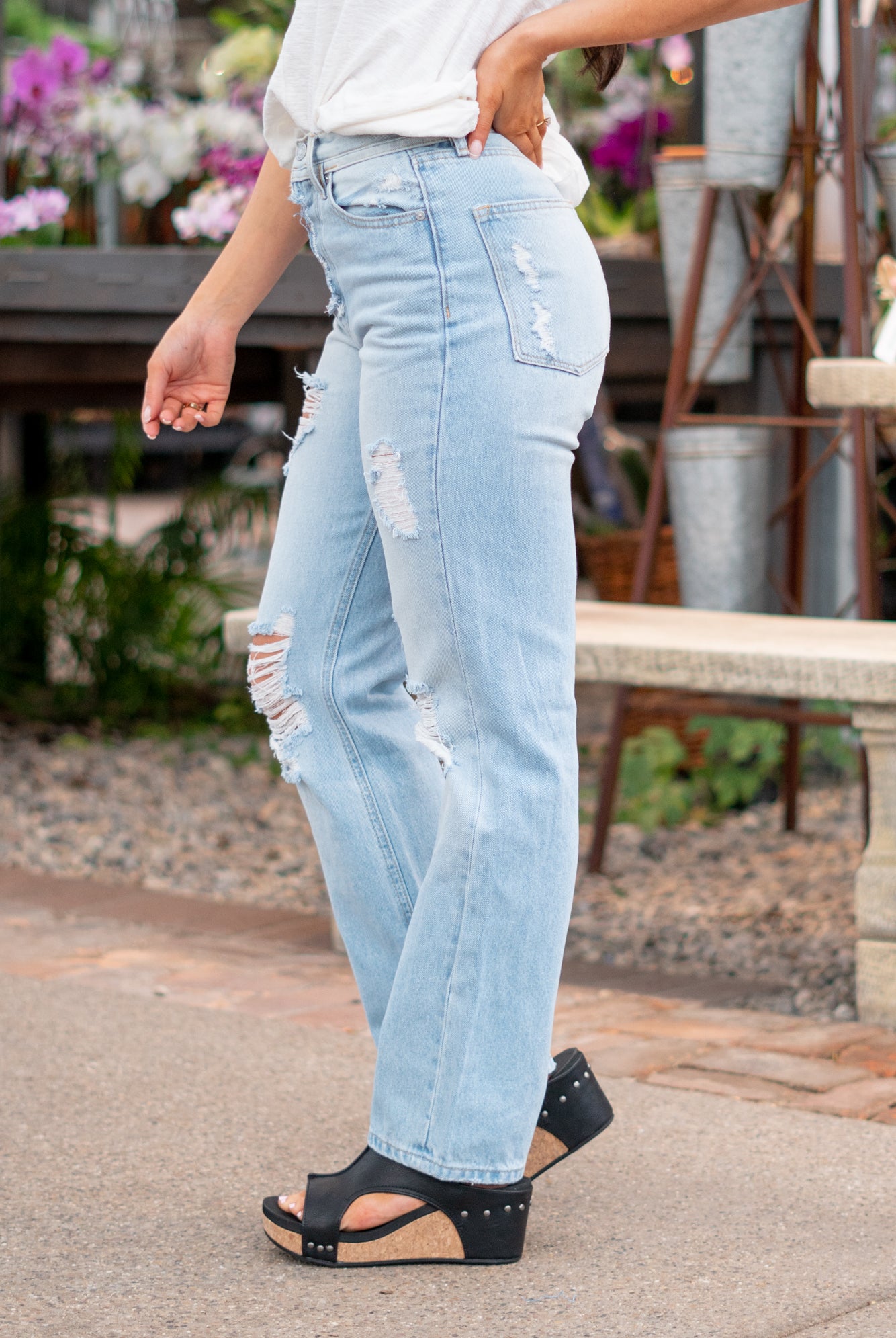 KanCan Jeans With a high waist and straight fit, these will be your go-to jeans that will never go out of style. Color: Medium Blue Cut: Straight Fit, 31" Inseam* Rise: High-Rise, 12.5" Front Rise* 100% Cotton, Rigid Denim Fly: Exposed Button Fly Style #: KC7912L Contact us for any additional measurements or sizing. *Measured on the smallest size, measurements may vary by size. Jacquelyn wears a size 25 in jeans, a small in tops, and 6.5 in shoes. She is wearing size 25 in these jeans.