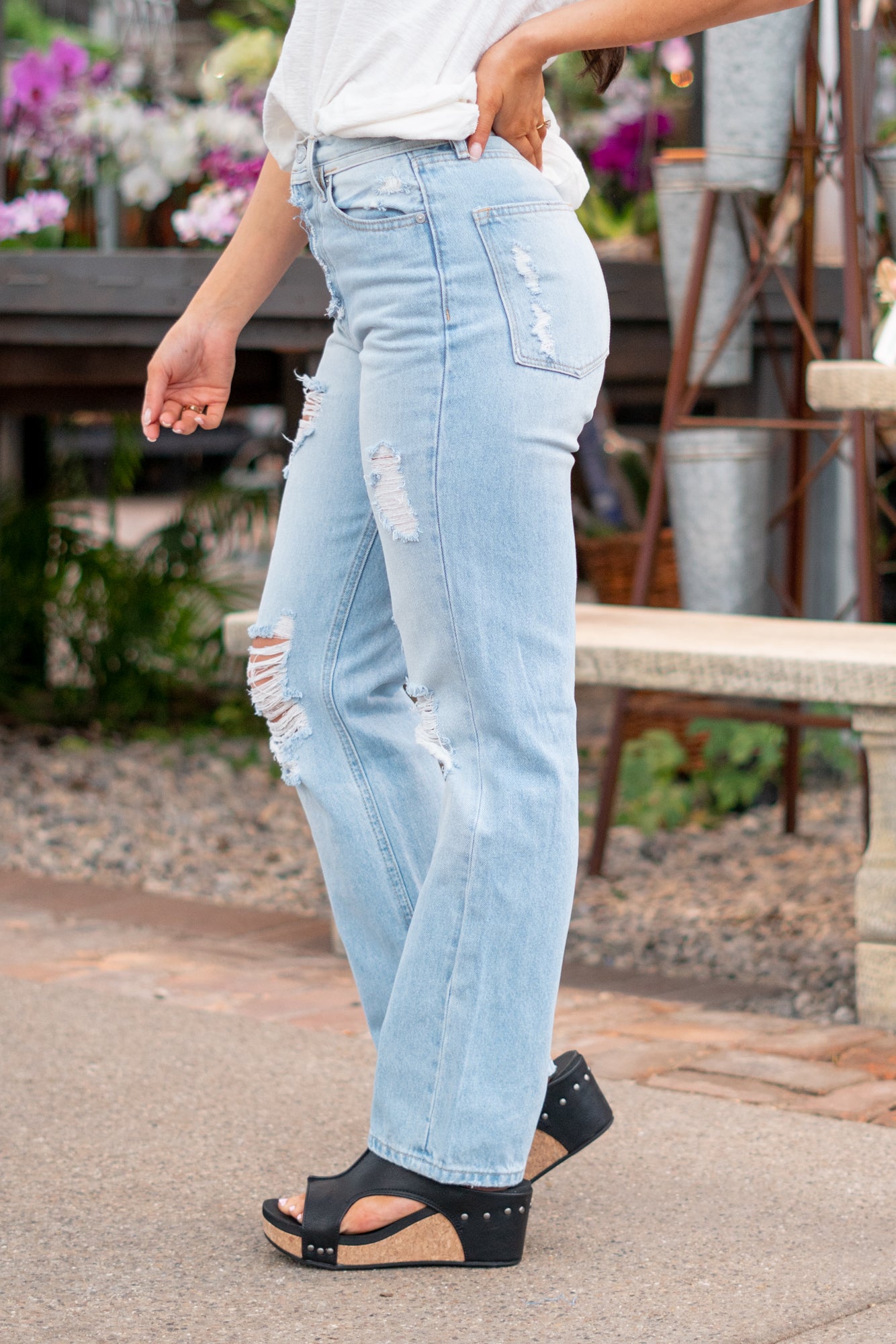 KanCan Jeans With a high waist and straight fit, these will be your go-to jeans that will never go out of style. Color: Medium Blue Cut: Straight Fit, 31" Inseam* Rise: High-Rise, 12.5" Front Rise* 100% Cotton, Rigid Denim Fly: Exposed Button Fly Style #: KC7912L Contact us for any additional measurements or sizing. *Measured on the smallest size, measurements may vary by size. Jacquelyn wears a size 25 in jeans, a small in tops, and 6.5 in shoes. She is wearing size 25 in these jeans.