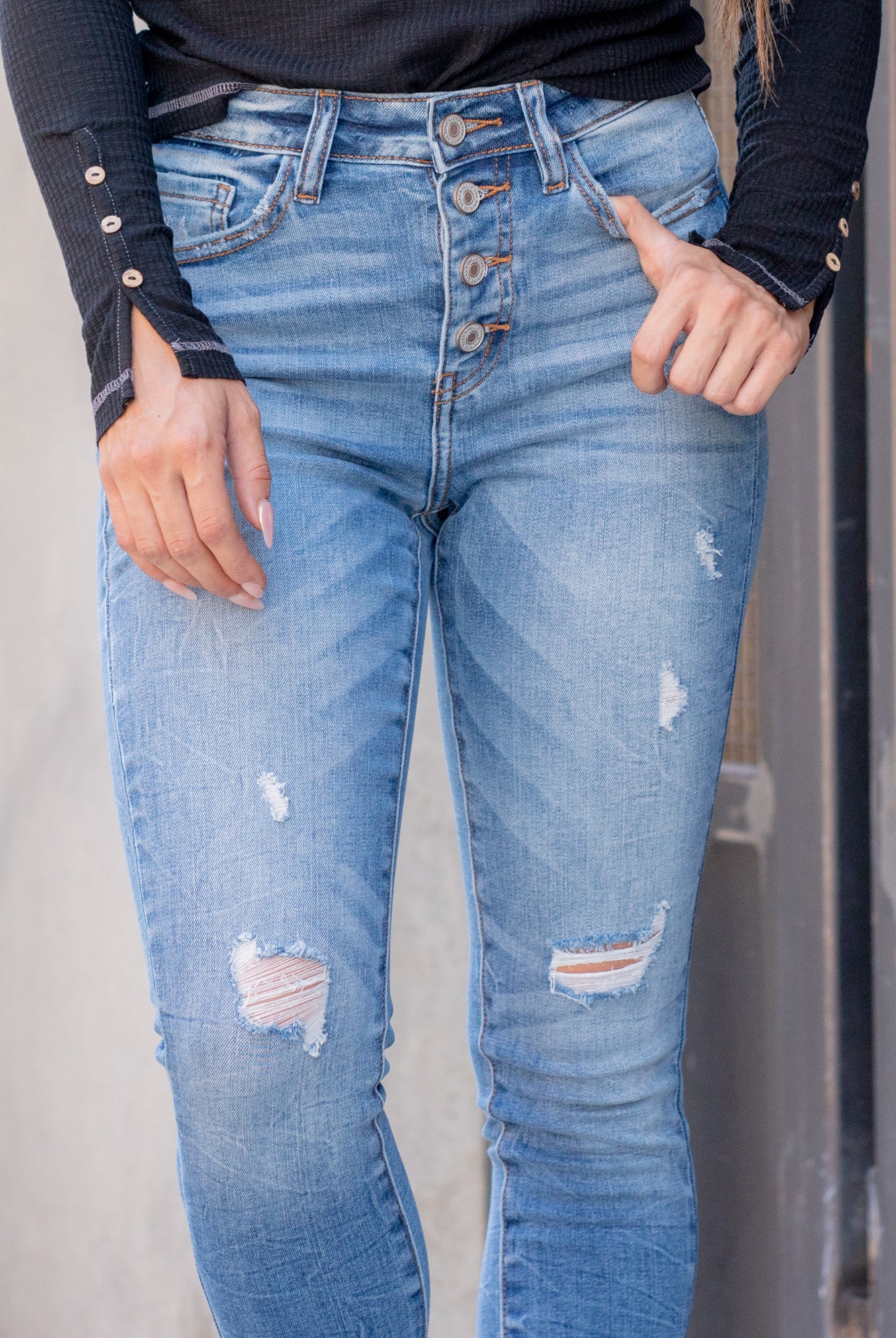 KanCan Jeans Color: Medium Blue Wash Cut: Ankle Skinny, 27" Inseam Rise: High Rise, 9.5" Front Rise 74% COTTON 10%RAYON 15% POLYESTER 1% SPANDEX Machine Wash Separately In Cold Water Stitching: Classic Fly: Exposed Button Style #: KC9157M Contact us for any additional measurements or sizing. *Measured on the smallest size, measurements may vary by size.