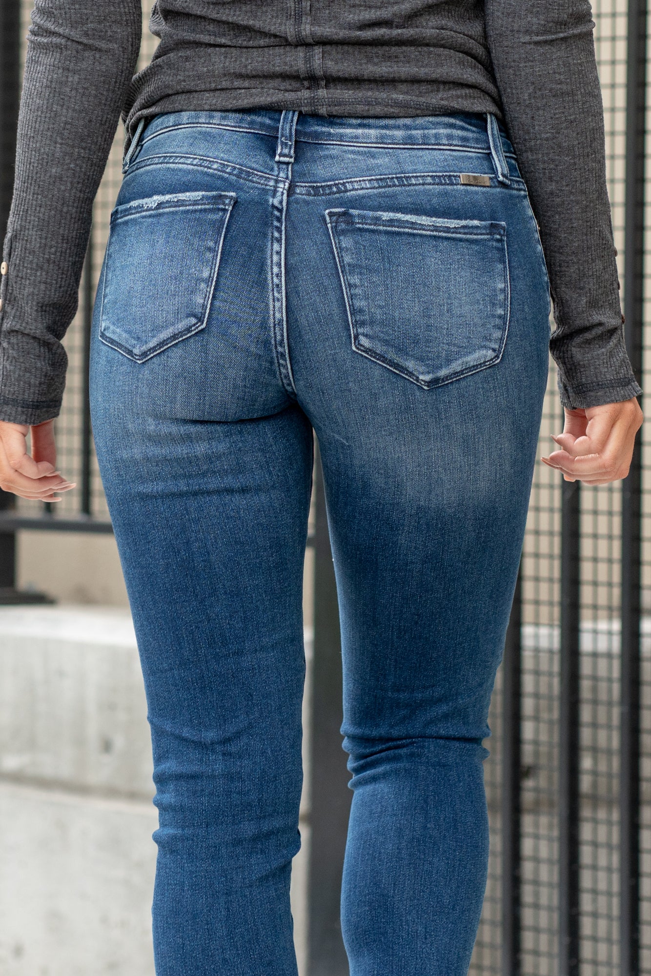 KanCan Jeans Collection: Core Collection Style Name: Buffalo Plaid Color: Dark Wash Cut: Ankle Skinny, 27" Inseam Rise: Mid-Rise, 8.5" Front Rise 92% Cotton 6% Polyester 2% Spandex Fly: Zipper Style #: KC6310D Contact us for any additional measurements or sizing. *Measured on the smallest size, measurements may vary by size. Sarah wears a size 25 in jeans, a small in tops, and 8 in shoes. She is wearing size 25 in these jeans.