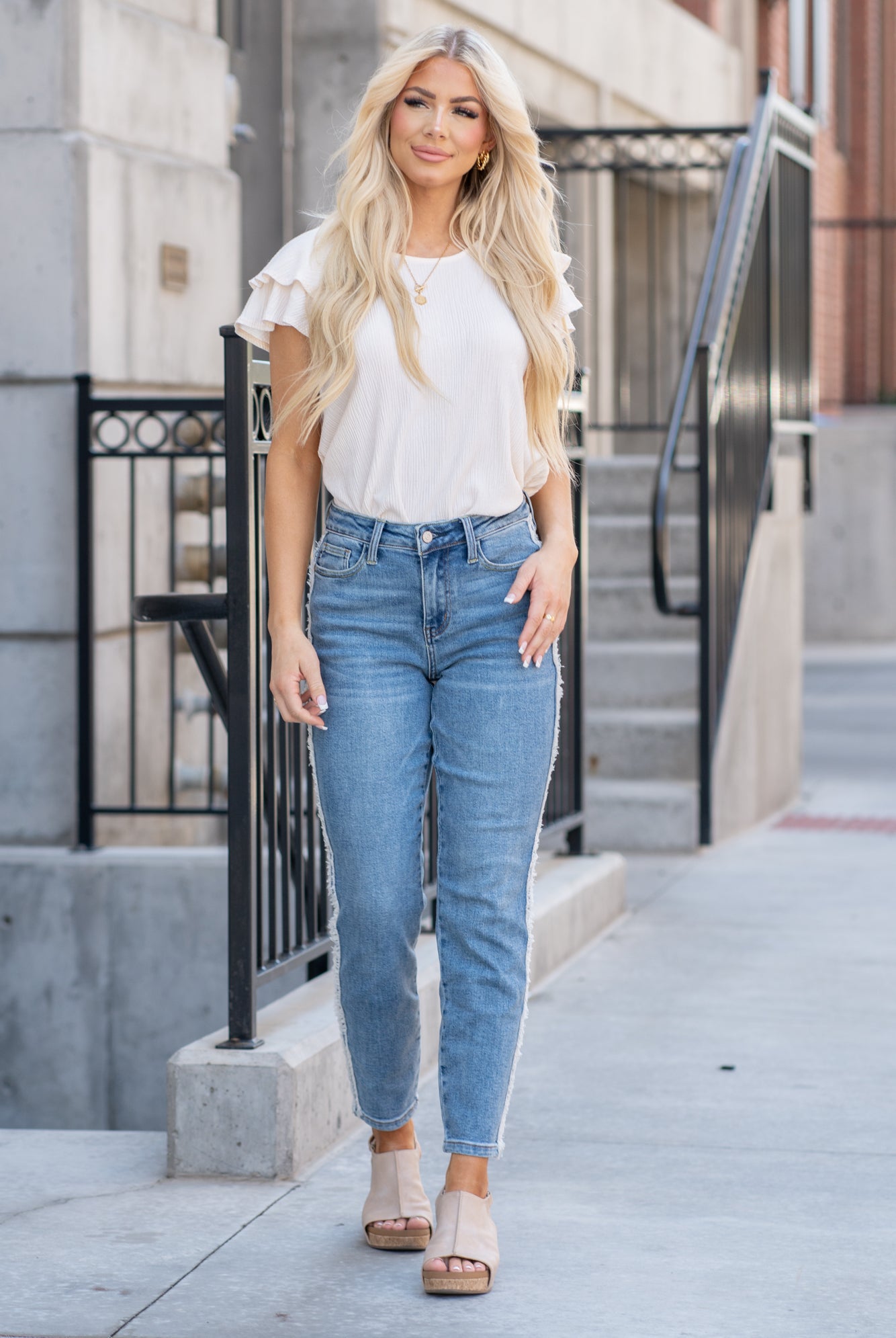 Judy Blue Tired of your skinny jeans? These cute slim fits will be your favorites. With a fringe fray seam detail, it's just enough detail to embellish your outfit. Color: Medium Blue Cut: Straight fit, 28.5" Inseam* High Rise, 10.5" Front Rise* Material: 94% Cotton / 5% Polyester / 1% Spandex Stitching: Classic Fly: Zipper Fly Style #: JB88461-PL | 88461-PL *Measured on the smallest size, measurements may vary by size. Contact us for any additional measurements or sizing.