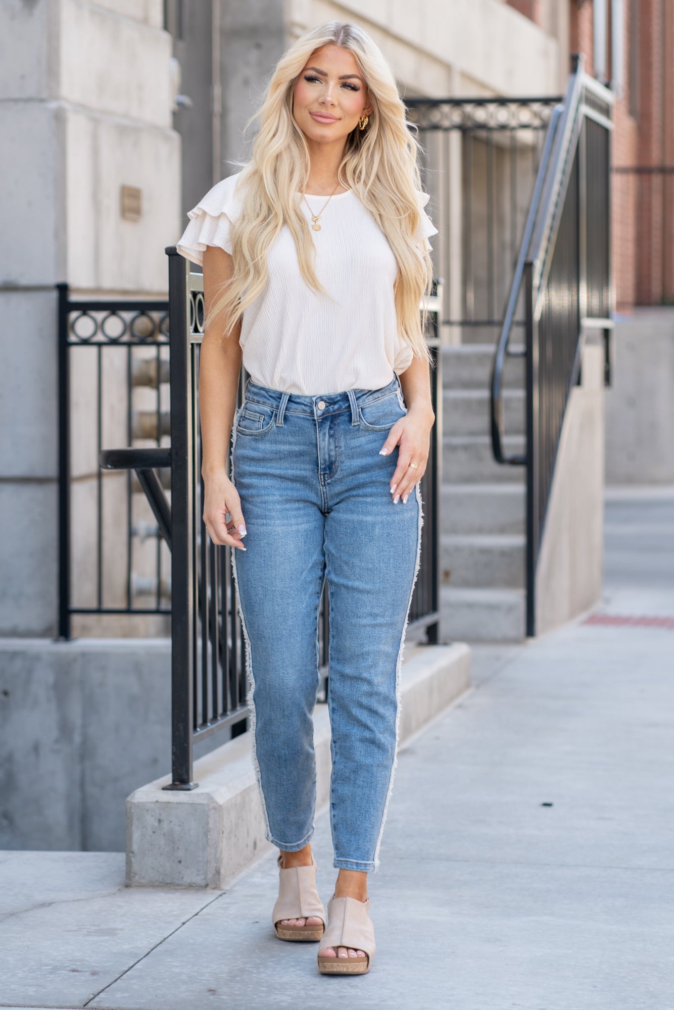 Judy Blue Tired of your skinny jeans? These cute slim fits will be your favorites. With a fringe fray seam detail, it's just enough detail to embellish your outfit. Color: Medium Blue Cut: Straight fit, 28.5" Inseam* High Rise, 10.5" Front Rise* Material: 94% Cotton / 5% Polyester / 1% Spandex Stitching: Classic Fly: Zipper Fly Style #: JB88461-PL | 88461-PL *Measured on the smallest size, measurements may vary by size. Contact us for any additional measurements or sizing.