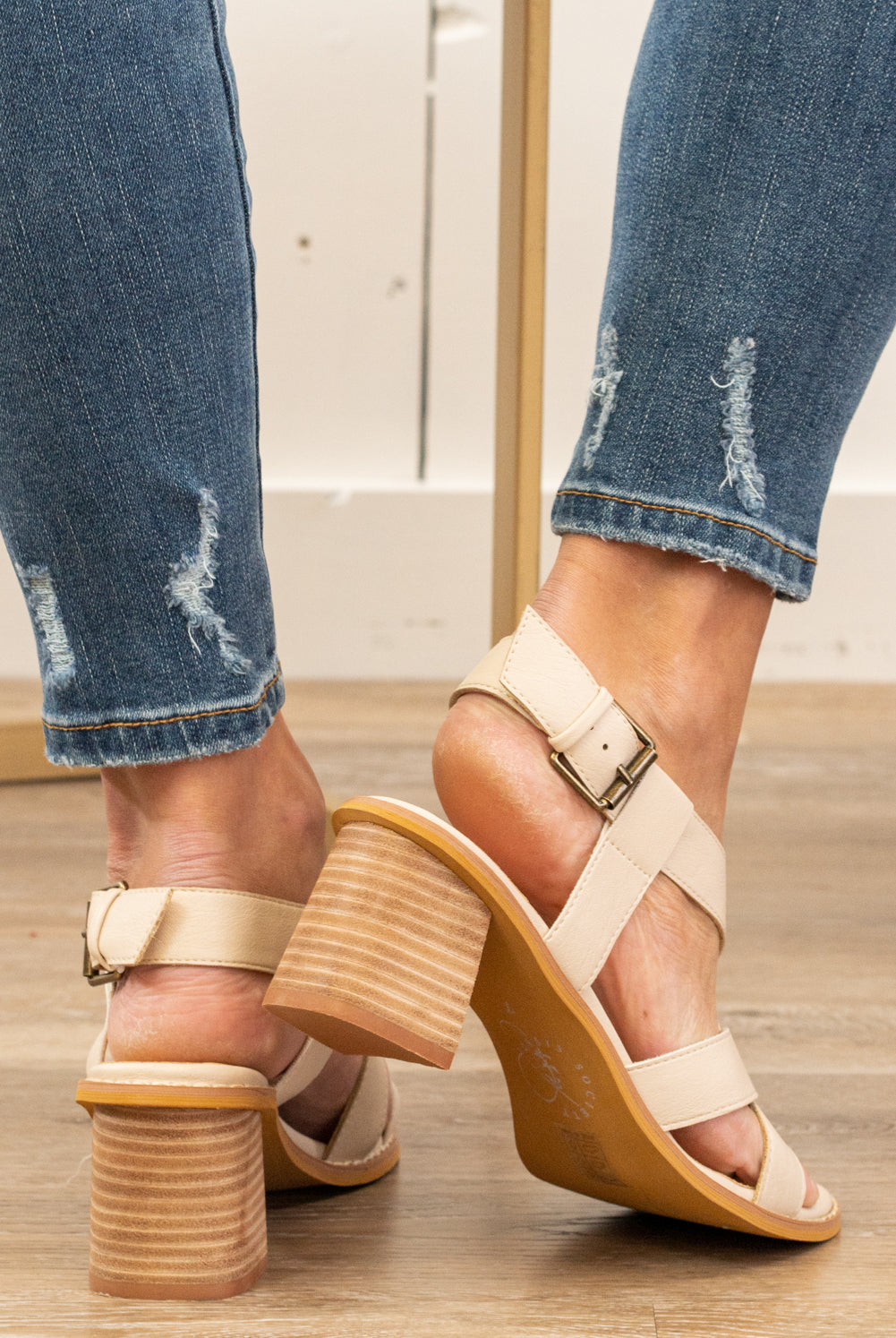 Oasis Society Shoes by Mi.iM  Feel chic all season in the Karter sandal. . Set on our signature padded footbed, they're a must for all-day comfort with wear. Beige Man-made Upper Padded footbed Leather Insole Leather Wrap Heel  Contact us for any additional measurements or sizing. 