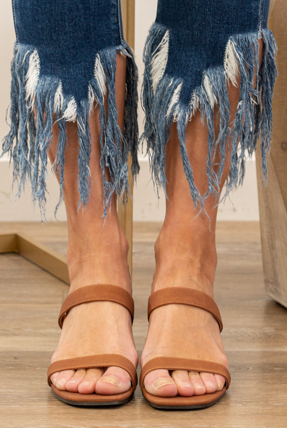 Wedge Sandals by Mi.iM The NATE is a must-wear this season with everything from midi dresses to cuffed jeans. The wedge heel is a leg-lengthening design cut to flatter every shape. Finished with their Signature Padded Footbed, they're also a must for all day comfort. Brown Man-made Upper Padded footbed Leather Insole Wooden Wrap Heel Contact us for any additional measurements or sizing.