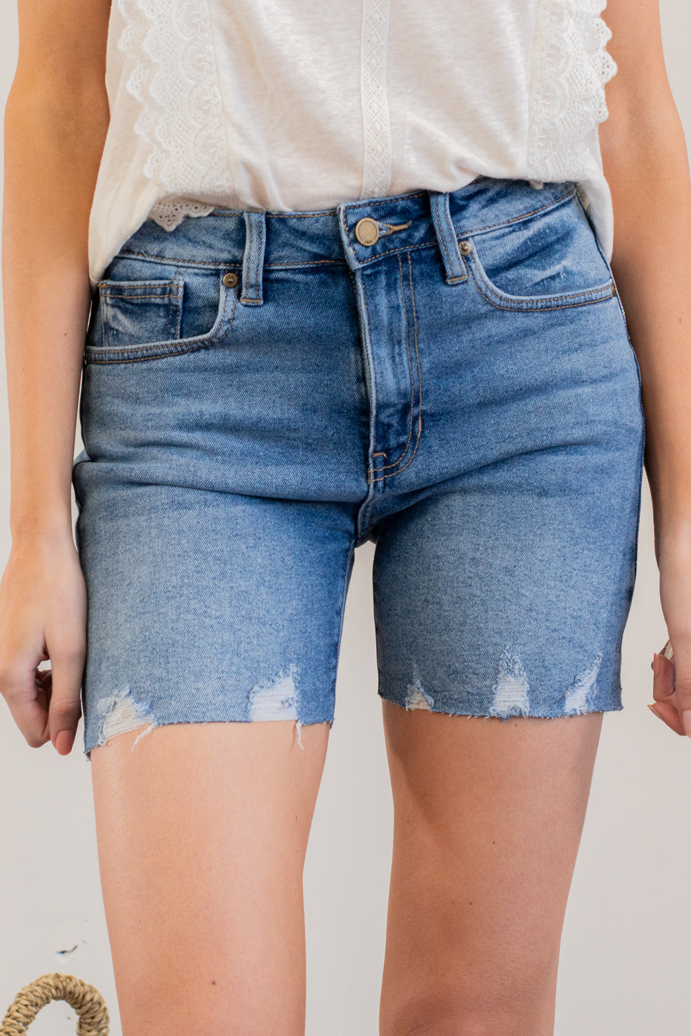 JBD by Just USA Jeans Color: Medium Blue Cut: Shorts, 5" Inseam High Rise, 10" Front Rise Stitching: Classic 95% Cotton 4% Polyester 1% Spandex Fly: Zipper Style #: DH615-MD Mckenna is 5'10" and 122 pounds. She wears a size small top, a 4 in jeans and a size 8.5 in shoes. She is wearing a size small in these shorts.