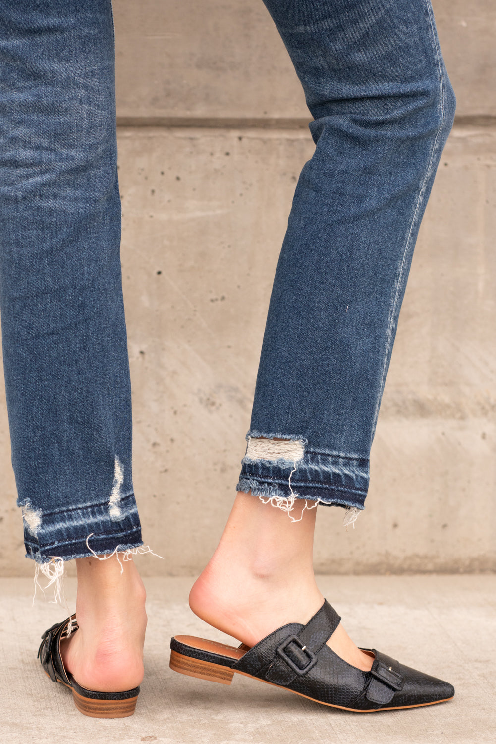 Flats by Mi.iM This creative slip on loafer adds a perfect amount of prep to any outfit! Buckles on the front give this slip on a fun pop of shine. Color: Navy Style Name: Hannah Man-made Leather Upper Genuine leather insole Heel Height: .5" Contact us for any additional measurements or sizing.