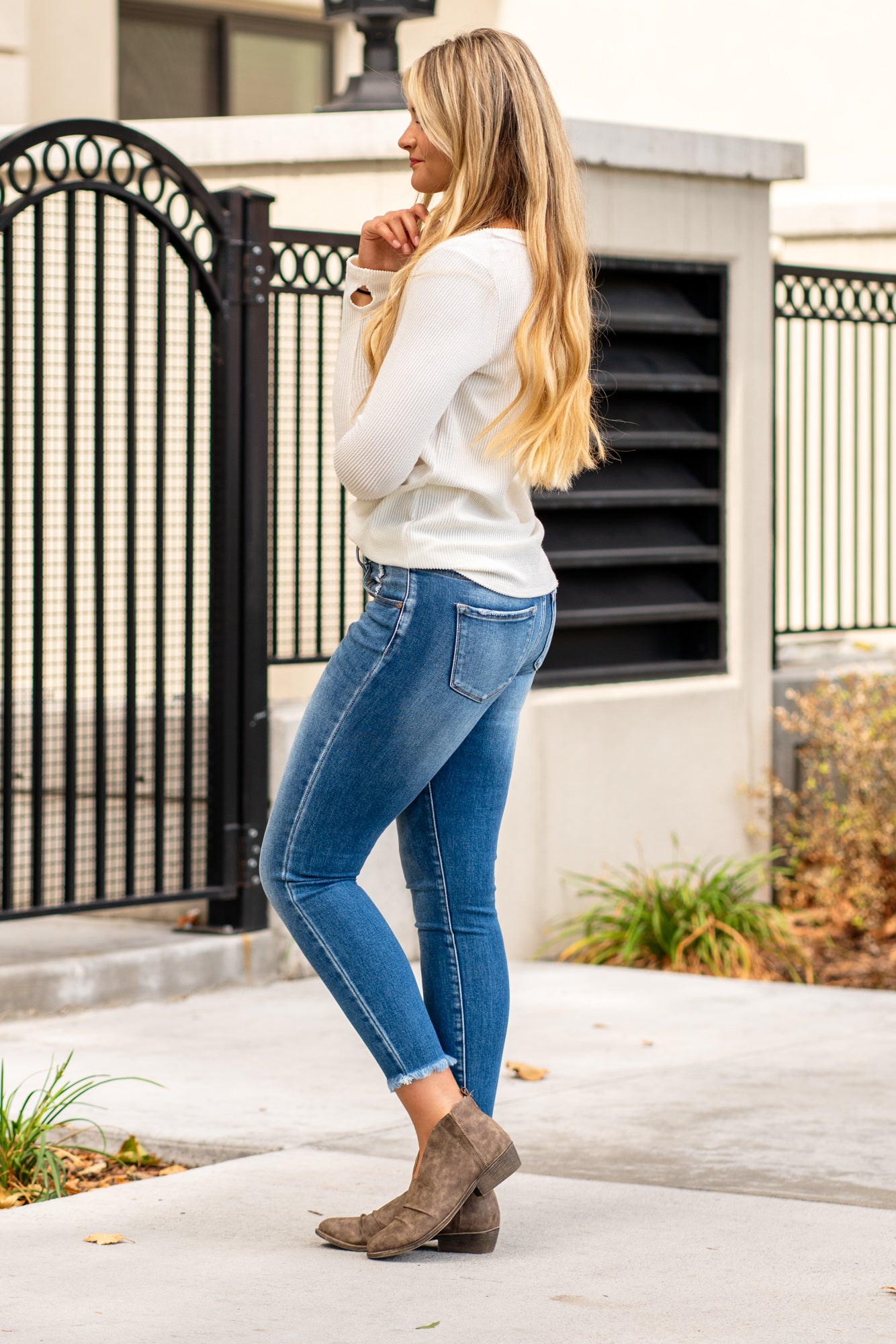 KanCan Jeans KanCan Stretchy with an asymmetrical waistband and frayed hem. Color: Medium Wash Cut: Ankle Skinny, 27" Inseam* Rise: High-Rise, 9" Front Rise* 93% COTTON , 5% POLYESTER , 2% SPANDEX Fly: Zipper Style #: KC6381M Contact us for any additional measurements or sizing. *Measured on the smallest size, measurements may vary by size.