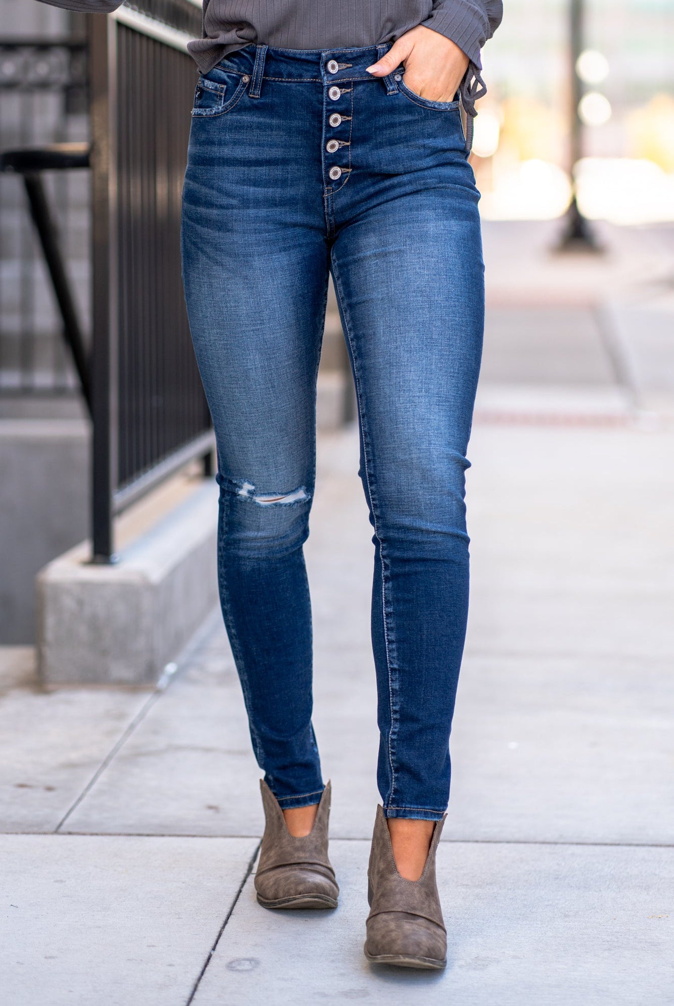 KanCan Jeans Color: Dark Wash Skinny, 29" Inseam* High Rise, 10" Front Rise* Frayed Hem Ankle with Ripped Distress 53.2% COTTON, 41.6% RAYON, 3.9% POLYESTER, 1.3% SPANDEX Fly: Zipper with Double Button Style #: KC7361D Contact us for any additional measurements or sizing. *Measured on the smallest size, measurements may vary by size.