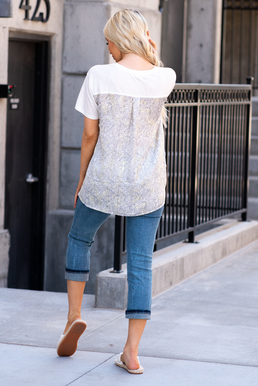 Mystree  This snake skin printed top will add a fresh print to your already overfilled boutique closet.   Collection: Spring 2021 Color: Off White Neckline: Round Sleeve: Short Sleeves 75% Viscose, 25% Polyester Style #: 19041-OffWhite Contact us for any additional measurements or sizing.