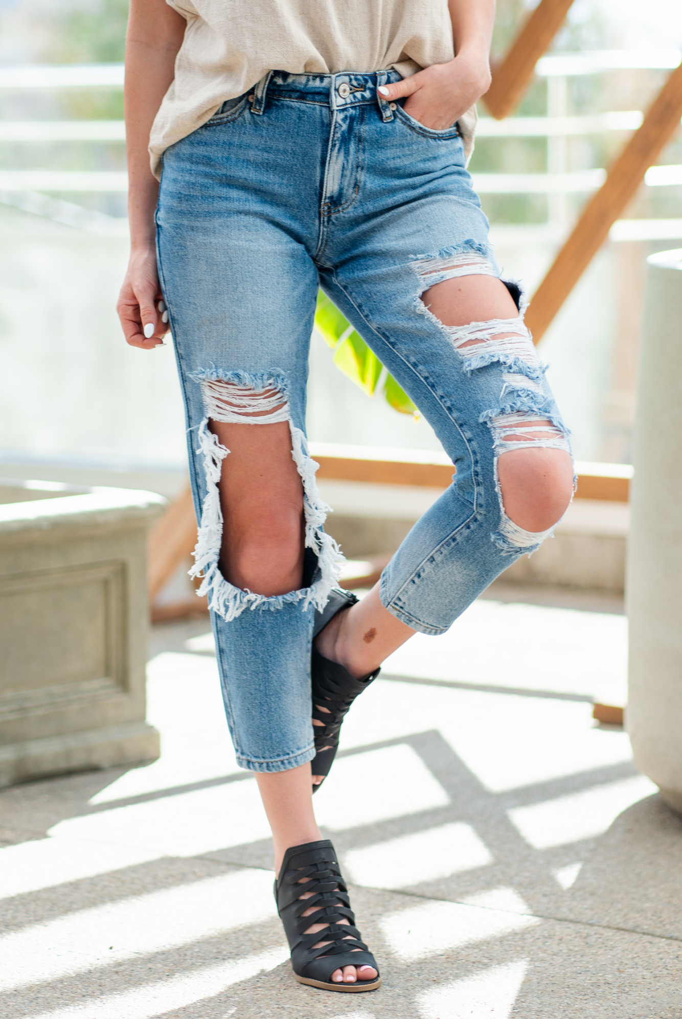 KanCan Jeans These boyfriend jeans will become your new favorite look. Pair with a tank and heels for a casual spring look. Color: Medium Blue Wash Cut: Straight Fit, 27" Inseam* Rise: Mid-Rise, 9.75" Front Rise* 94% COTTON, 5% POLYESTER, 1% SPANDEX Fly: Exposed Button Fly Style #: KC8571M Contact us for any additional measurements or sizing. *Measured on the smallest size, measurements may vary by size.