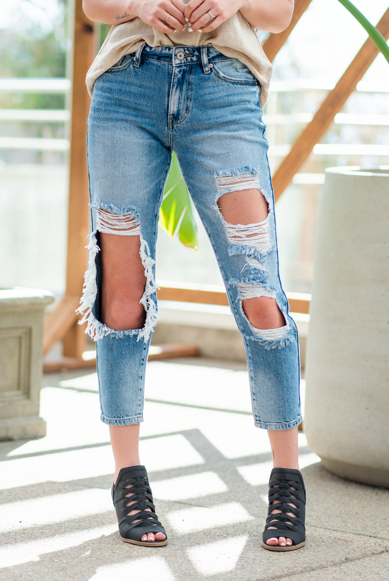 KanCan Jeans These boyfriend jeans will become your new favorite look. Pair with a tank and heels for a casual spring look. Color: Medium Blue Wash Cut: Straight Fit, 27" Inseam* Rise: Mid-Rise, 9.75" Front Rise* 94% COTTON, 5% POLYESTER, 1% SPANDEX Fly: Exposed Button Fly Style #: KC8571M Contact us for any additional measurements or sizing. *Measured on the smallest size, measurements may vary by size.
