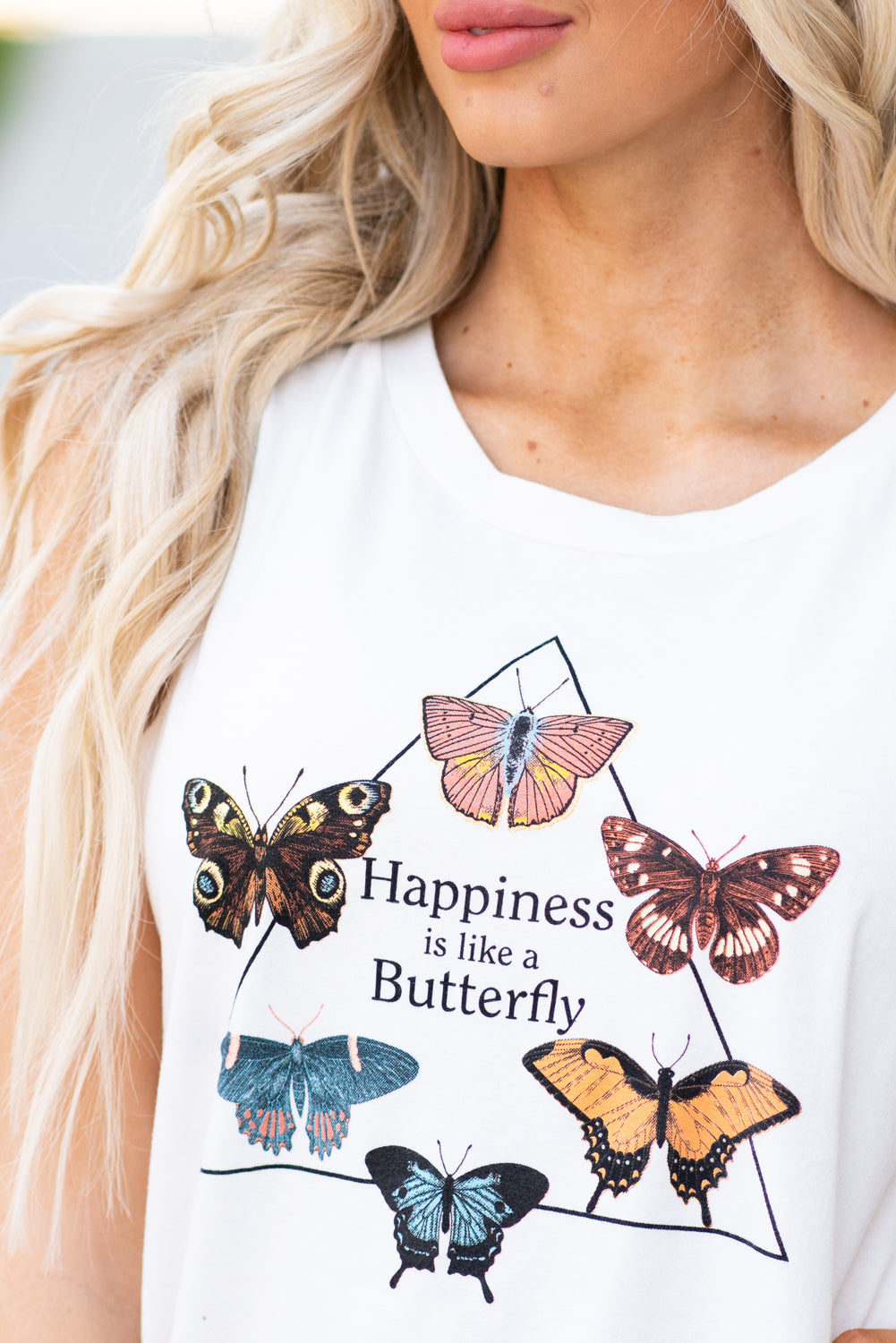 Hem & Thread Light and easy, pair this pretty graphic tee with your favorite ankle skinnies. Color: White Neckline: Crew Sleeve: Sleeveless 95% COTTON 5% SPANDEX Style #: 30540-White Contact us for any additional measurements or sizing.