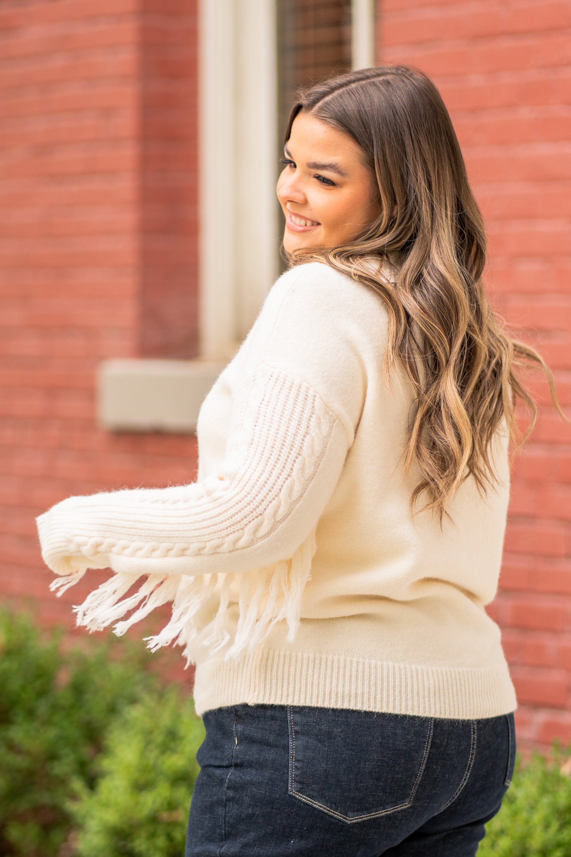 BiBi Throw on for a warm casual look with your favorite jeans this fall. Color: Cream Neckline: Crew Sleeve: Long Style #: IP7026 Contact us for any additional measurements or sizing.