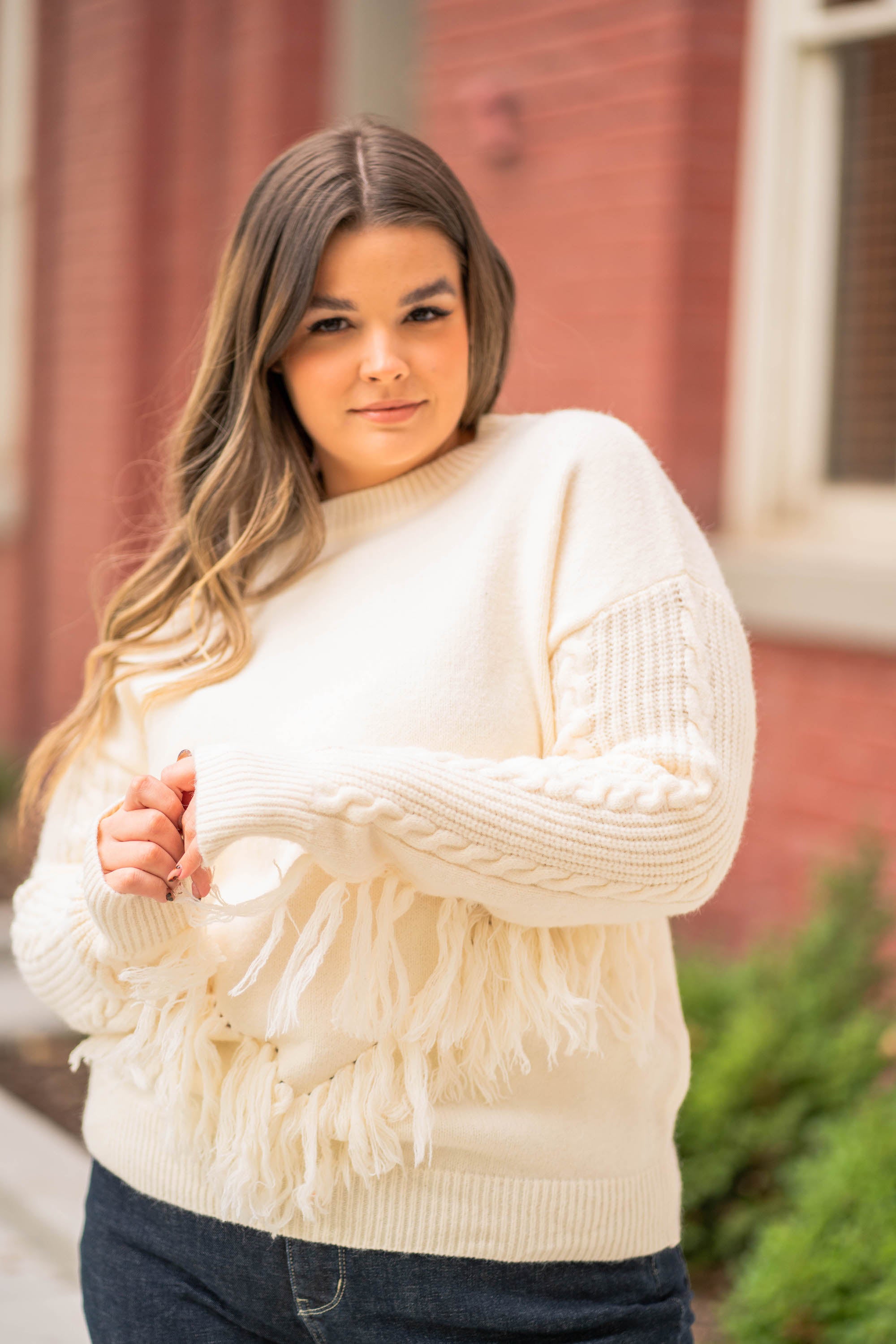 BiBi Throw on for a warm casual look with your favorite jeans this fall. Color: Cream Neckline: Crew Sleeve: Long Style #: IP7026 Contact us for any additional measurements or sizing.