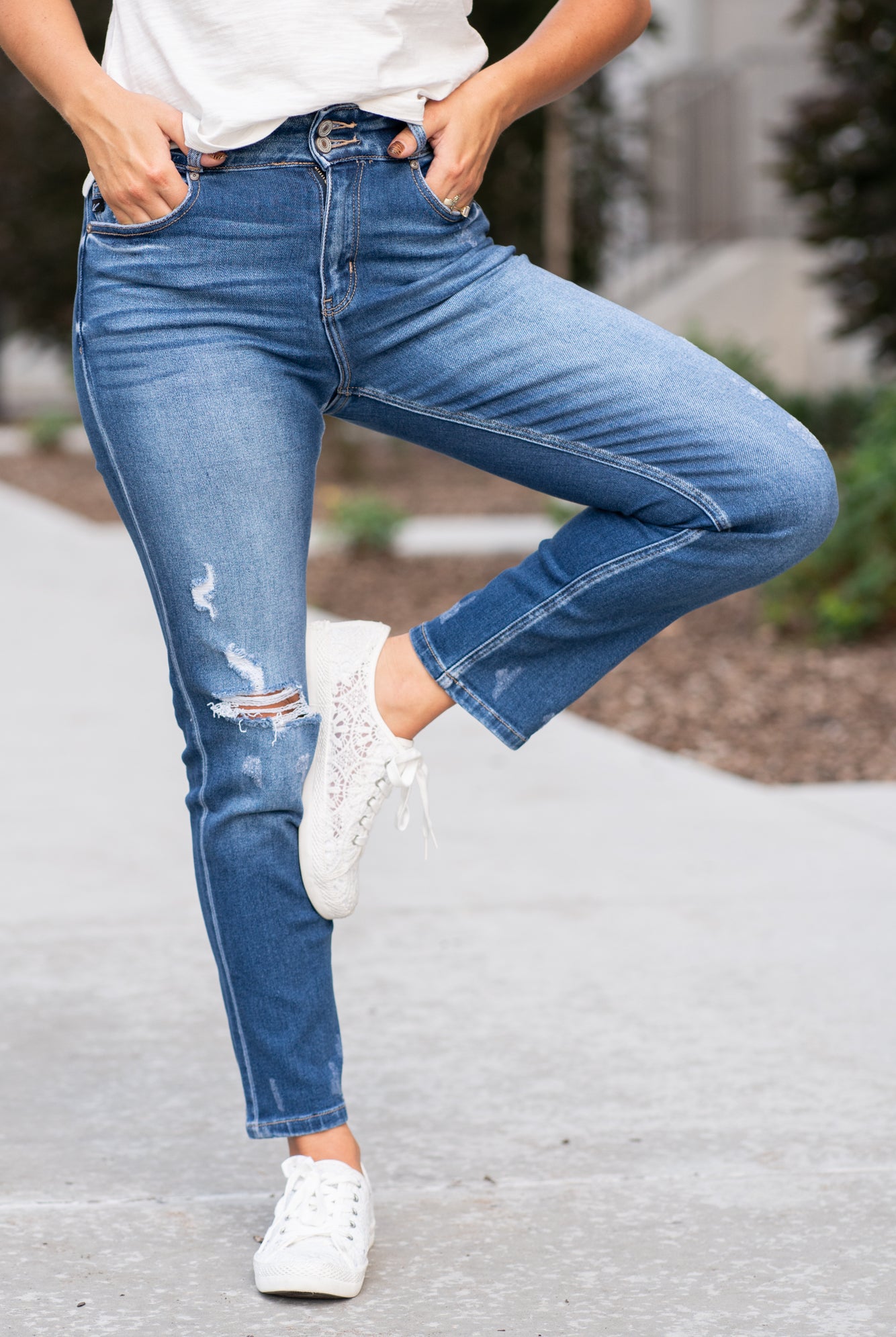 KanCan Jeans These high-rise slim straight jeans hit at exactly the right spot on your waist and with some spandex, these will stretch as you wear and get super comfy! KanCan Stretch Level: Comfort Stretch Color: Medium Blue Wash Cut: Cuffed Boyfriend, 28.5" Inseam Rise: High-Rise, 10.5" Front Rise 93% COTTON, 5% POLYESTER, 2% SPANDEX Stitching: Classic Fly: Zipper Style #: KC9253D Contact us for any additional measurements or sizing.