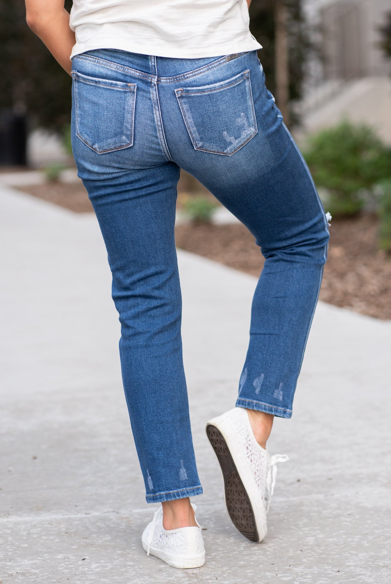 KanCan Jeans These high-rise slim straight jeans hit at exactly the right spot on your waist and with some spandex, these will stretch as you wear and get super comfy! KanCan Stretch Level: Comfort Stretch Color: Medium Blue Wash Cut: Cuffed Boyfriend, 28.5" Inseam Rise: High-Rise, 10.5" Front Rise 93% COTTON, 5% POLYESTER, 2% SPANDEX Stitching: Classic Fly: Zipper Style #: KC9253D Contact us for any additional measurements or sizing.