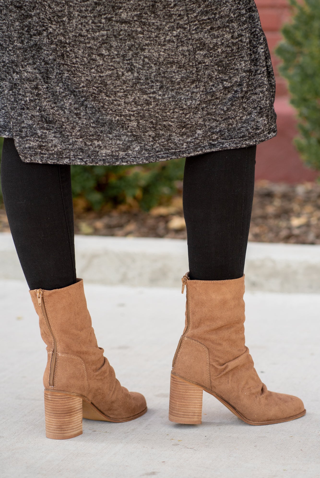 Boots by Oasis Society These scrunched boots with zipper closures and block heels are great with skinny jeans and oversized cardigans this fall. Color: Camel Man-made Upper Leather Wrap heel Padded footbed Shaft Height: 6.75" Heel Height: 3.25" Contact us for any additional measurements or sizing.