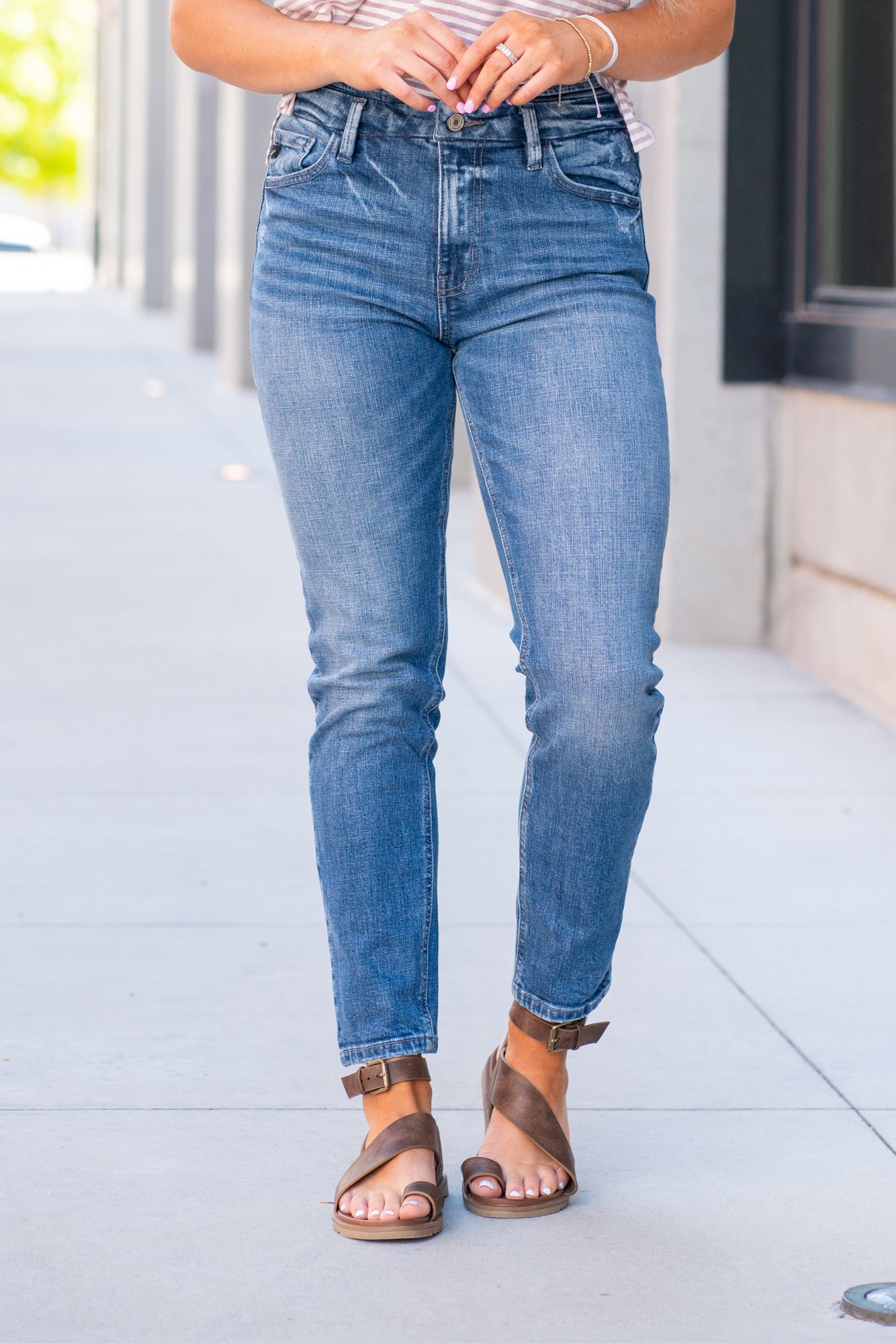 KanCan Jeans With a high waist and mom fit, these will be your go-to jeans that will never go out of style. Color: Medium Blue Cut: Mom Fit, 28" Inseam* Rise: High-Rise, 10.5" Front Rise* 98% Cotton 2% Spandex Fly: Zipper Style #: KC8671M Contact us for any additional measurements or sizing. *Measured on the smallest size, measurements may vary by size.