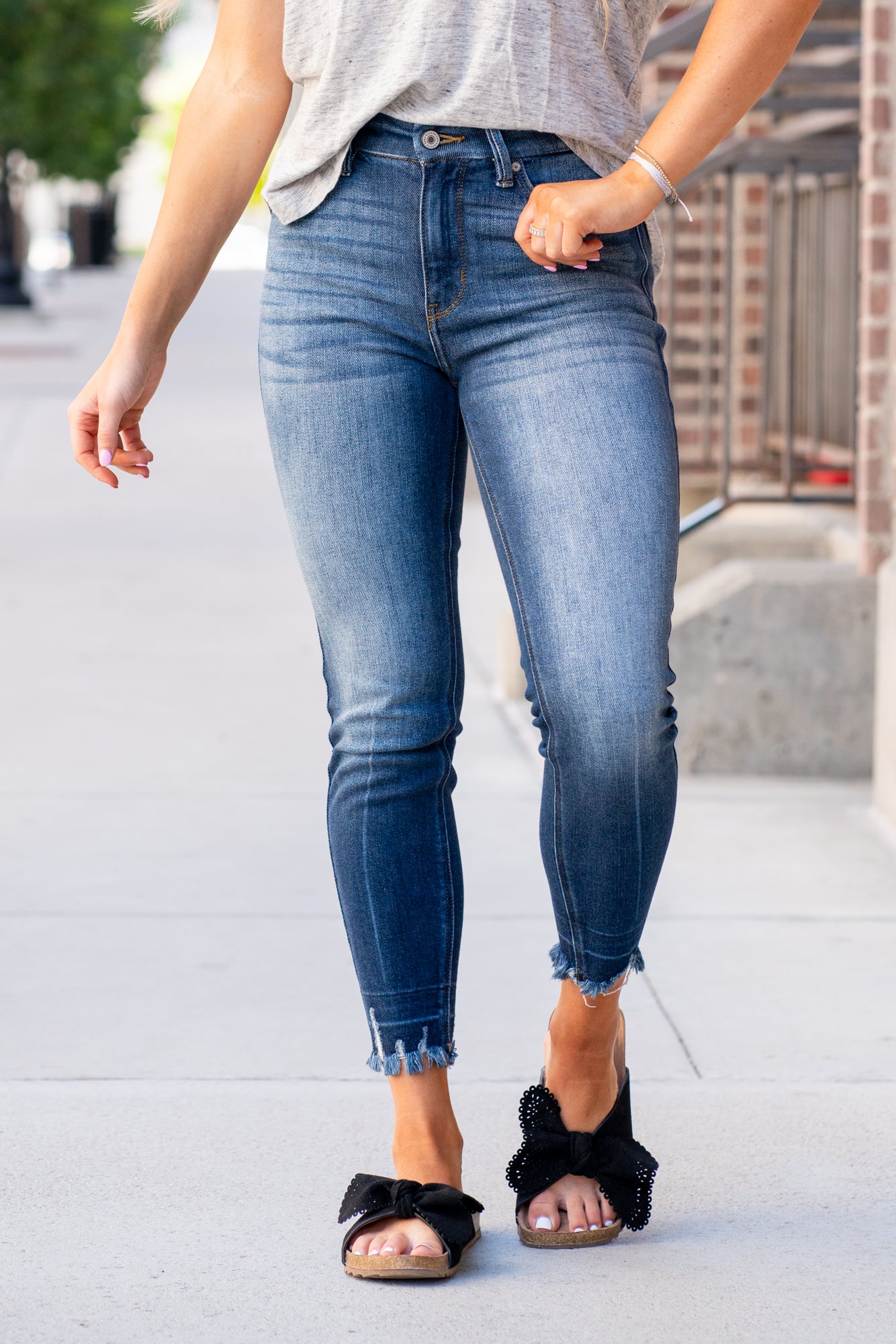 KanCan Jeans Color: Dark Wash Released Hem Ankle Cut: Ankle Skinny, 27" Inseam* Rise: High-Rise, 10" Front Rise* 94% COTTON, 5% POLYESTER, 1% SPANDEX Stitching: Classic Fly: Zipper Style #: KC9245D Contact us for any additional measurements or sizing. *Measured on the smallest size, measurements may vary by size.