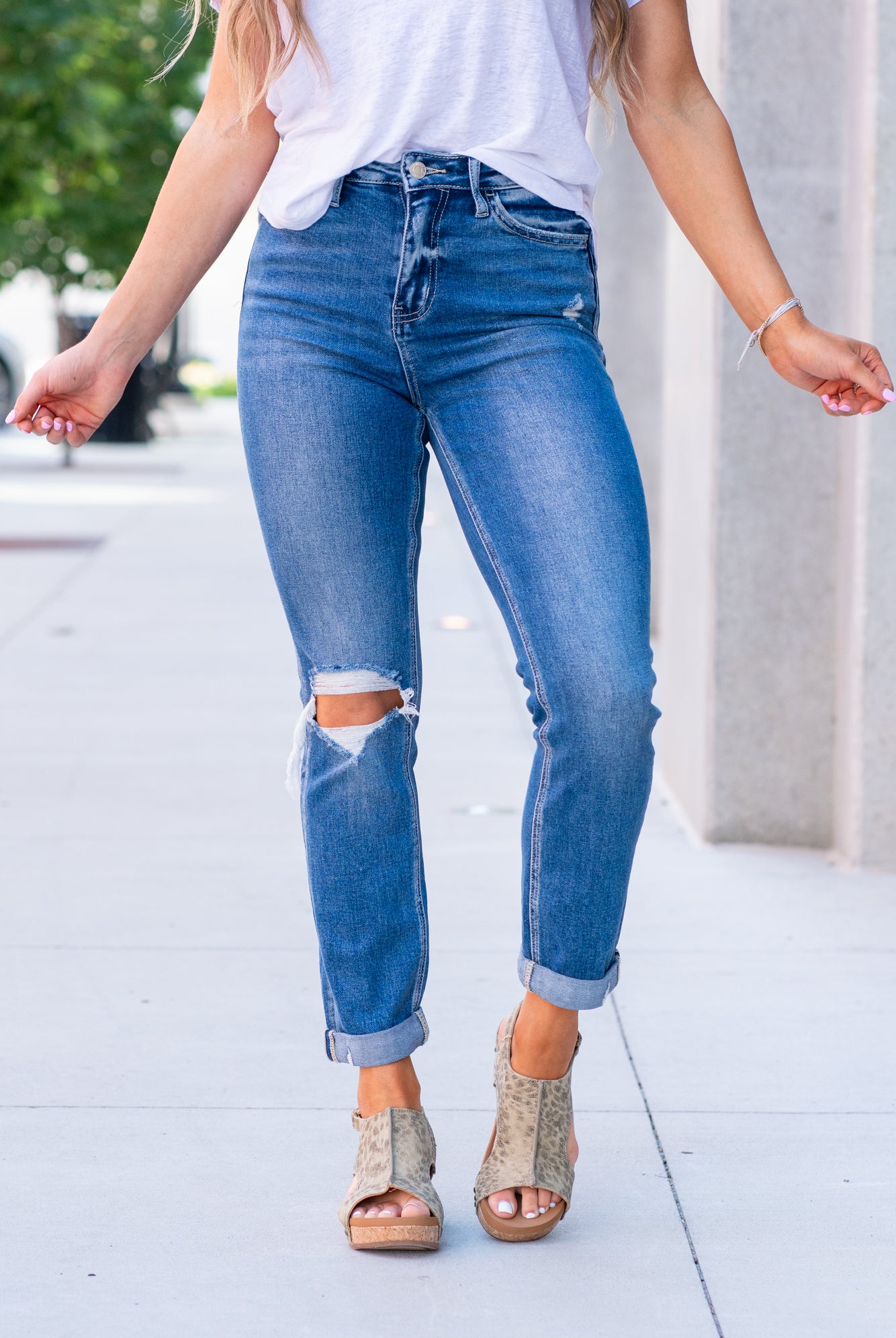 Vervet Flying Monkey Jeans These high-waisted straight-leg jeans have a soft stretch material that will feel so comfortable. Straight legs and distressed detail with the classic 5-pocket design and cuffed hem. Color: Medium Blue Wash Cut: Straight, 26* Rise: High-Rise, 11" Front Rise* Material: 90.5% COTTON, 7.5% POLYESTER, 2% SPANDEX Machine Wash Separately In Cold Water Stitching: Classic Fly: Zip Fly Style #: V2218-MD