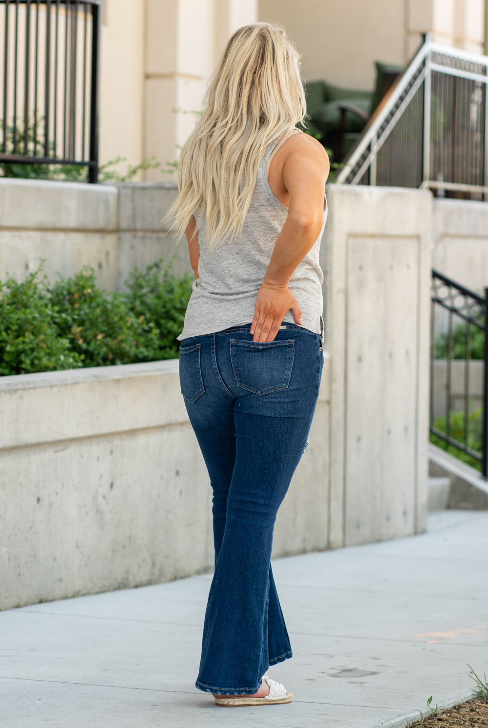 KanCan Maternity Jeans Do you miss wearing jeans? These maternity jeans will keep you comfy and cute with an elastic stretch waistband that fits over the tummy. Color: Dark Blue Wash Ripped Distressed Denim Patched Legs Fray Hem Detail Cut: Flare, 30" Inseam Rise: Mid-Rise with Full Tummy Band, 5.5" Material: 94% COTTON, 4% T-400, 2% SPANDEX Style #: KC3014D Contact us for any sizing questions or measurements.