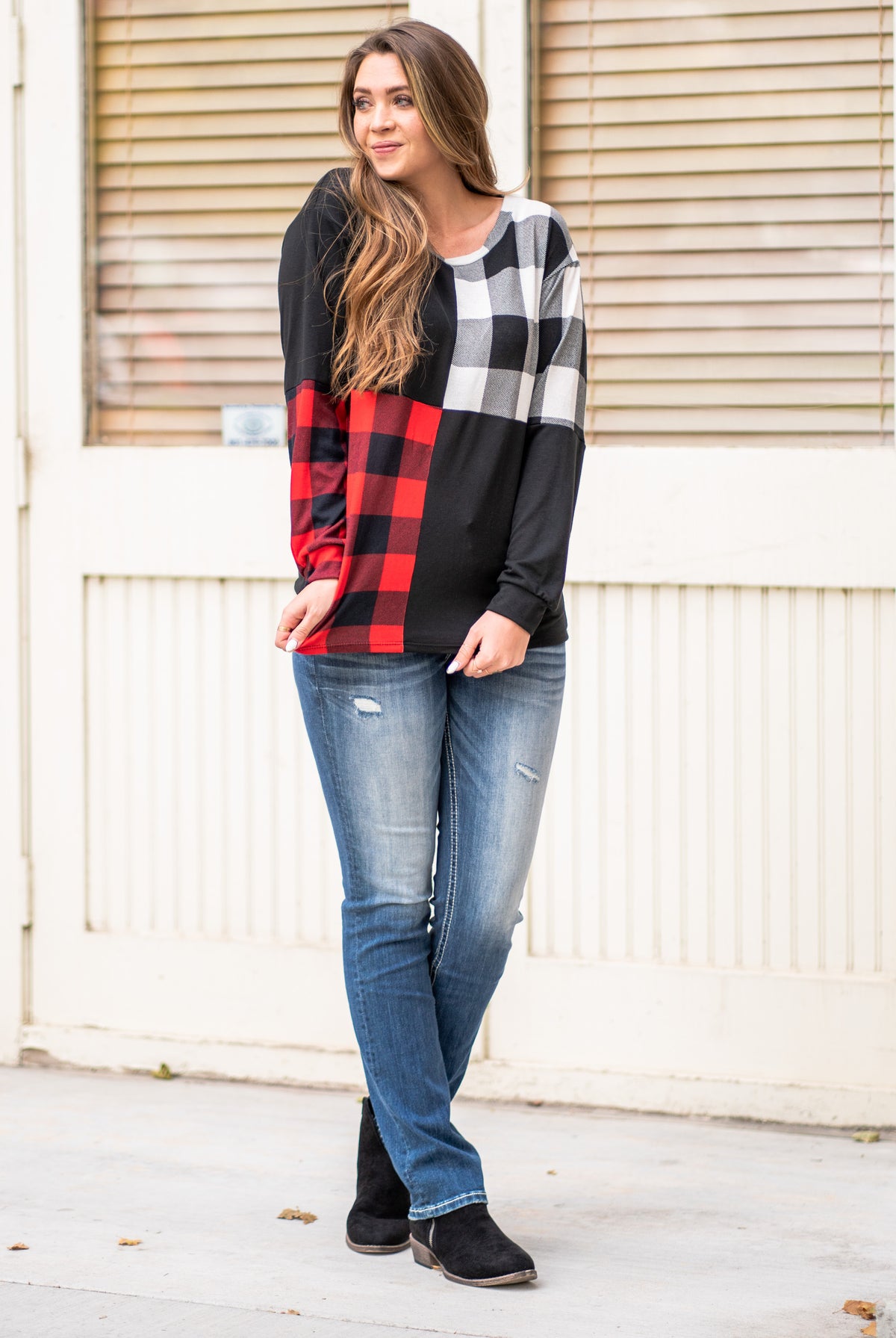BiBi Throw on for an easy casual look with your favorite jeans this fall. Color: Black Neckline: V Neck Sleeve: Long Style #: BT2116 Contact us for any additional measurements or sizing.
